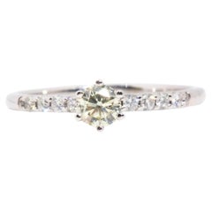 Bague de fiançailles vintage en or blanc 18 carats avec diamant rond brillant jaune clair
