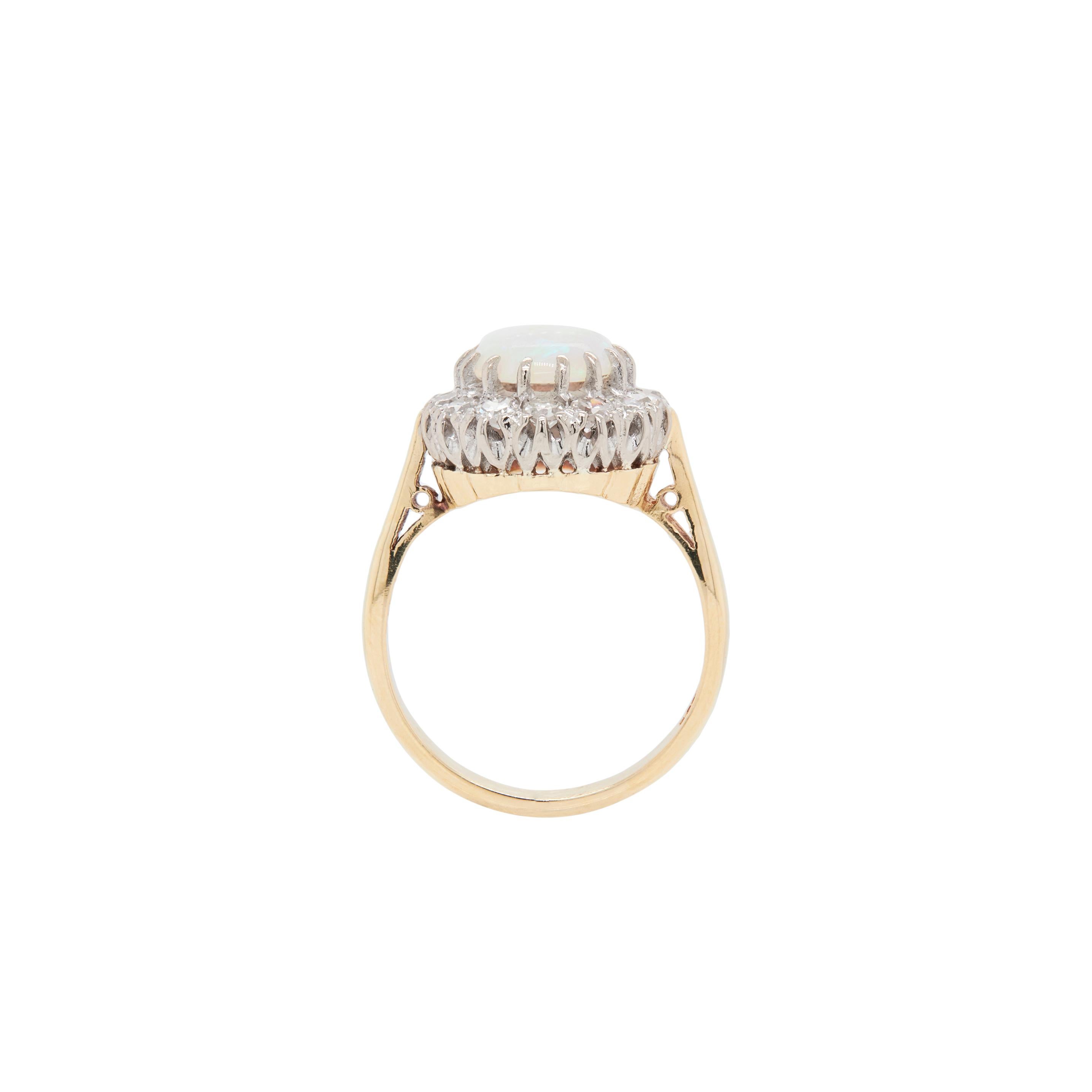 Vintage 18 Carat Yellow Gold Oval Opal and Diamond Cluster Ring In Excellent Condition For Sale In London, GB