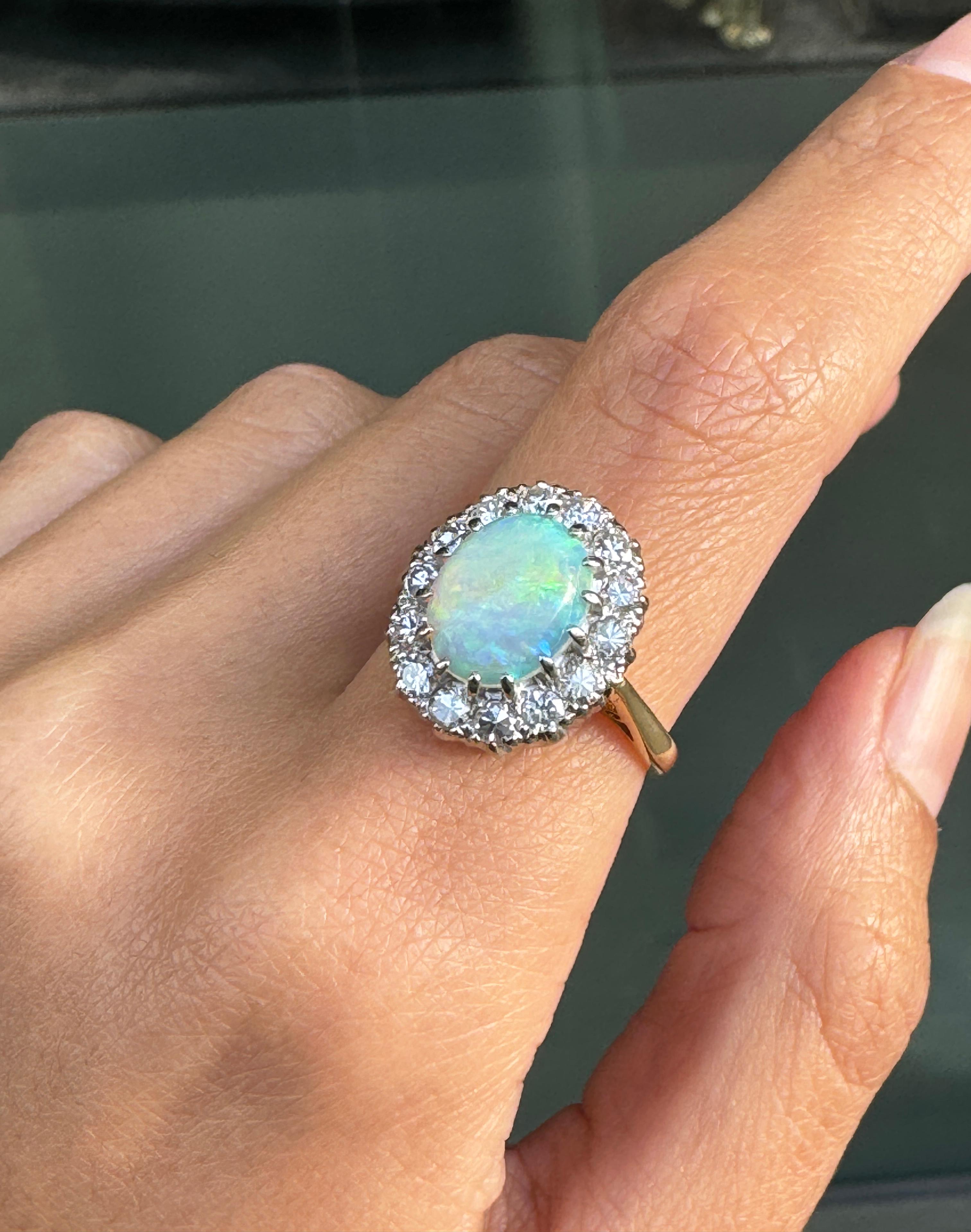 Women's Vintage 18 Carat Yellow Gold Oval Opal and Diamond Cluster Ring For Sale