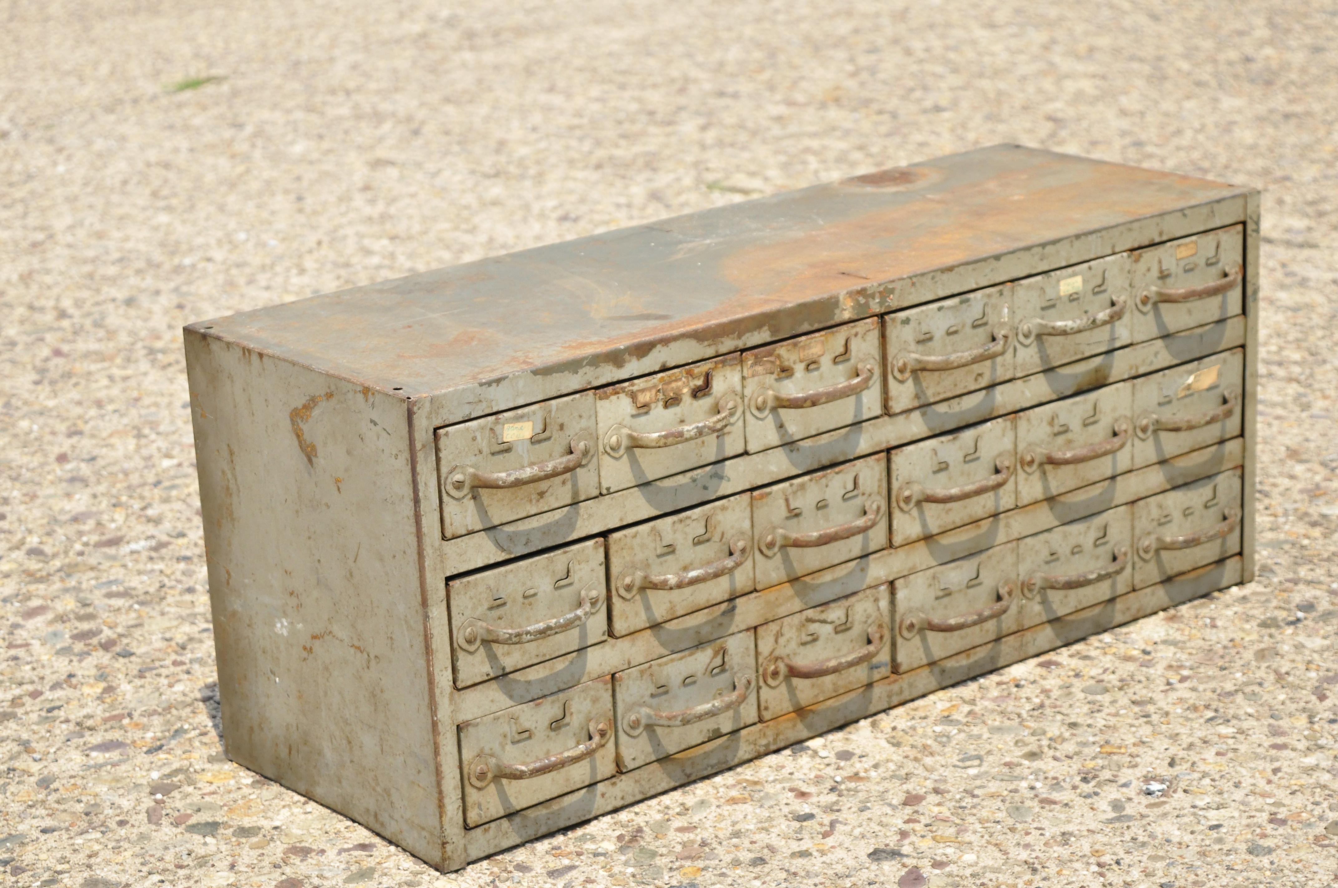 Vintage 18 Drawer steel metal industrial green machinist tool chest cabinet. Item features (18) drawers, steel construction, distressed finish, quality American craftsmanship. Circa mid 20th century. Measurements: 14