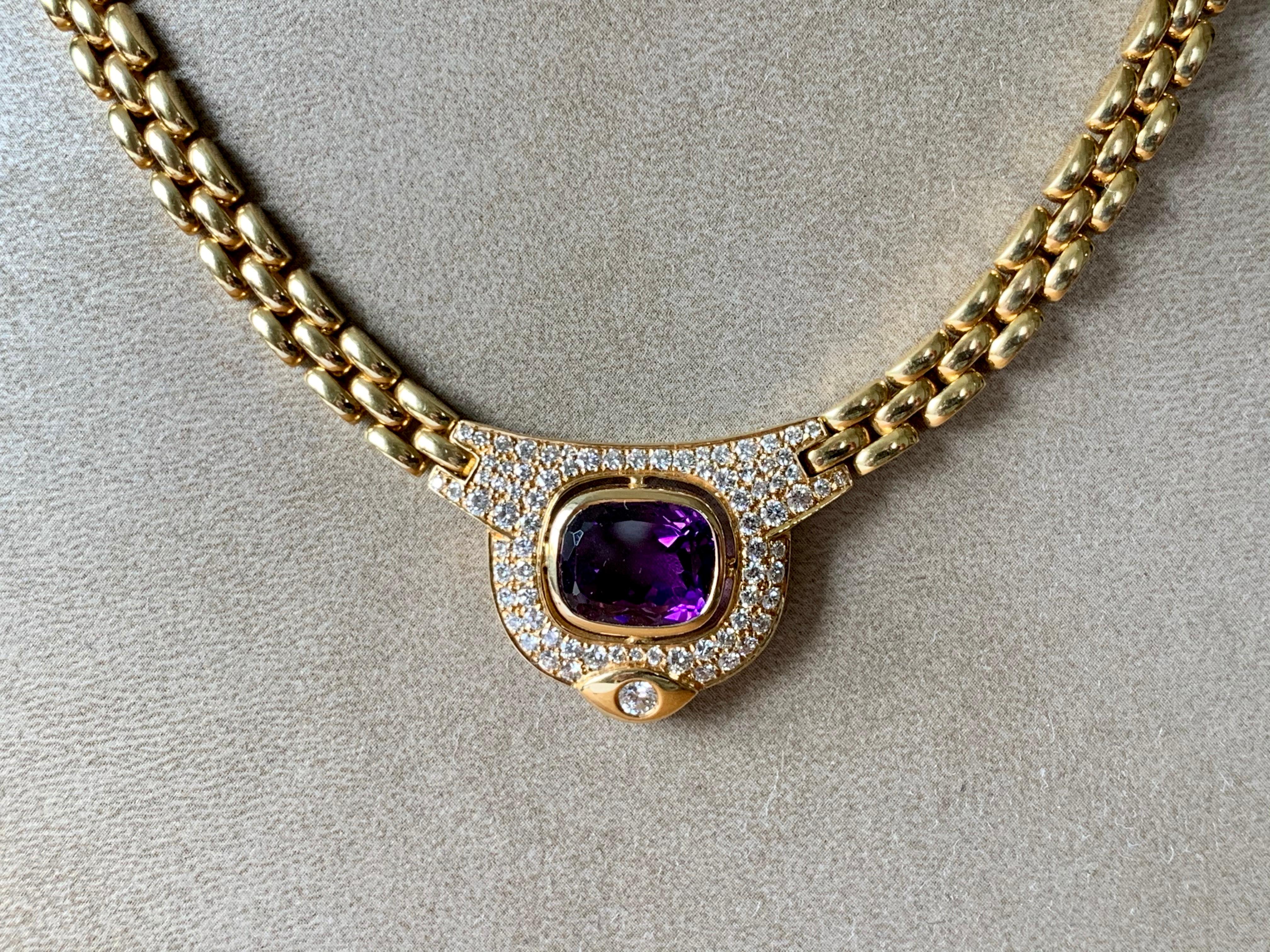A solid  18 K yellow Gold link chain necklace by Kurz Zurich with a pendant featuring an oval Amethyst with intense color weighing approximately 5 ct and 81  brilliant cut Diamonds weighing 1.30 ct, G color, vs clarity. 
Length: 40 cm. 
Authenticity