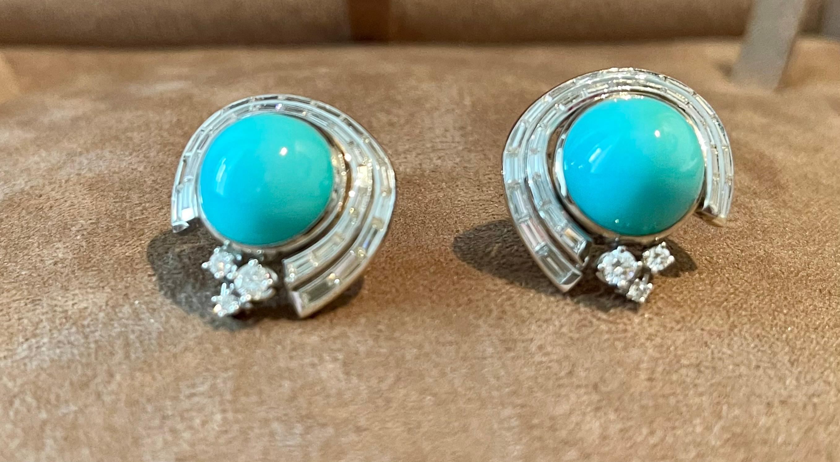 A pair of 18 K white Gold Diamond and Turquoise earclips created by master Swiss goldsmith Paul Binder, c. 1980s. Signed with maker's mark, stamped 750. Set with  60 baguette Diamonds and 6 brilliant cut Diamonds weighing  1.97 ct, F/G,if/vvs and 2
