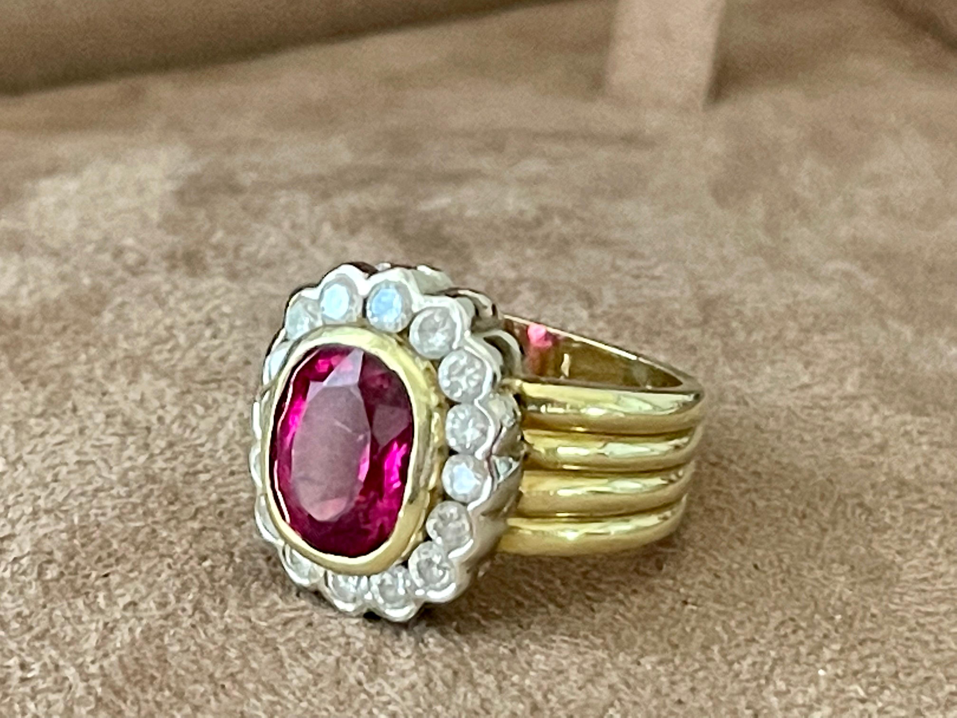 Gorgeous and solid 18 K yellow Gold and white Gold Ring featuring a lovely oval pink Tourmaline estimated ca. 4.50 ct., surrounded by 16 brilliant cut Diamonds weighing approximately 1.30 ct, H color, si clarity.
The ring is currently size 54/14