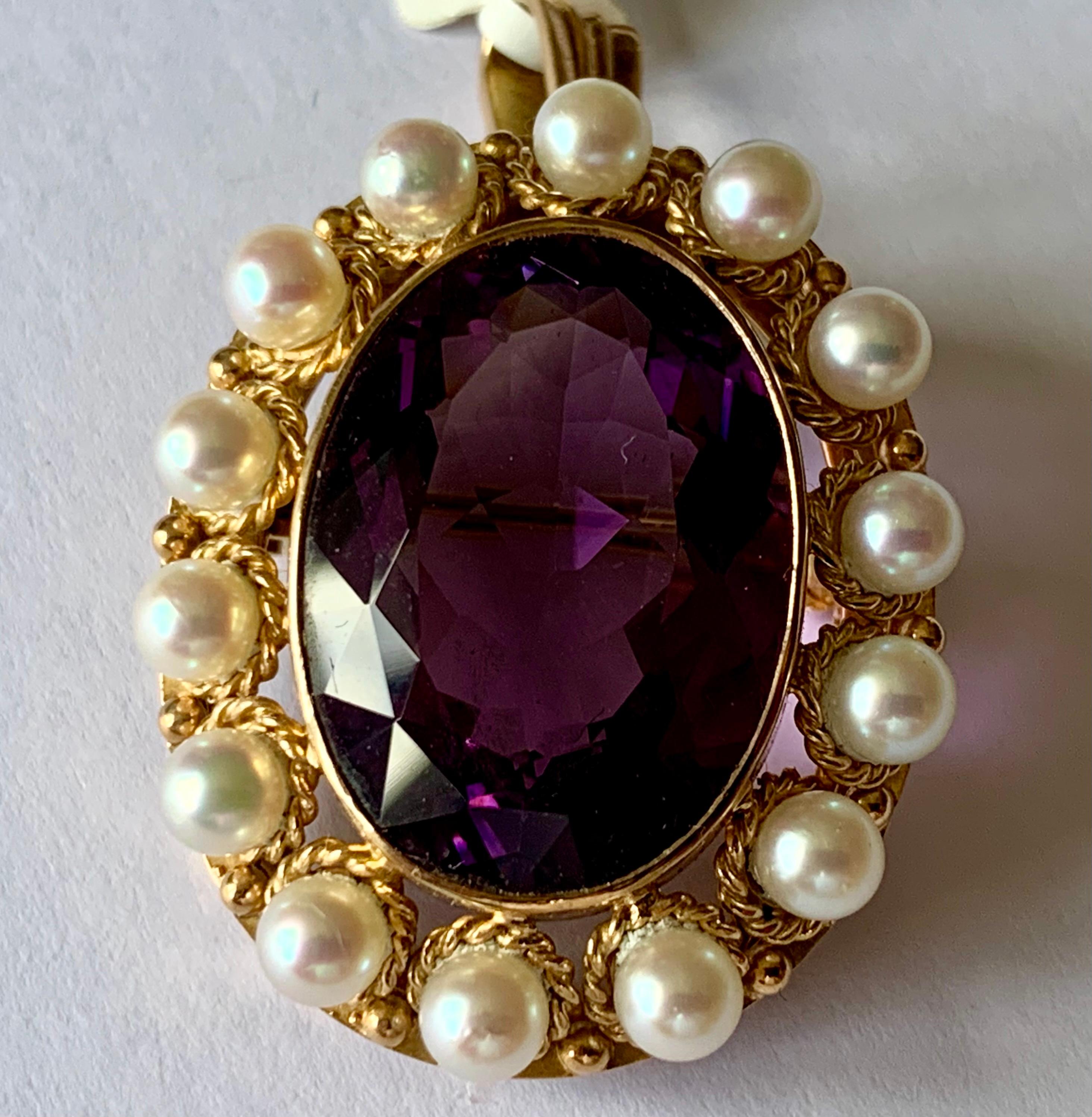Romantic Vintage brooch/pendant in 18 K yellow Gold inspired by the Victorian era featuring an oval cut Amethyst and cultured pearls in a rope textured setting. 
Matching ring available!
Masterfully handcrafted piece! Authenticity and money back is