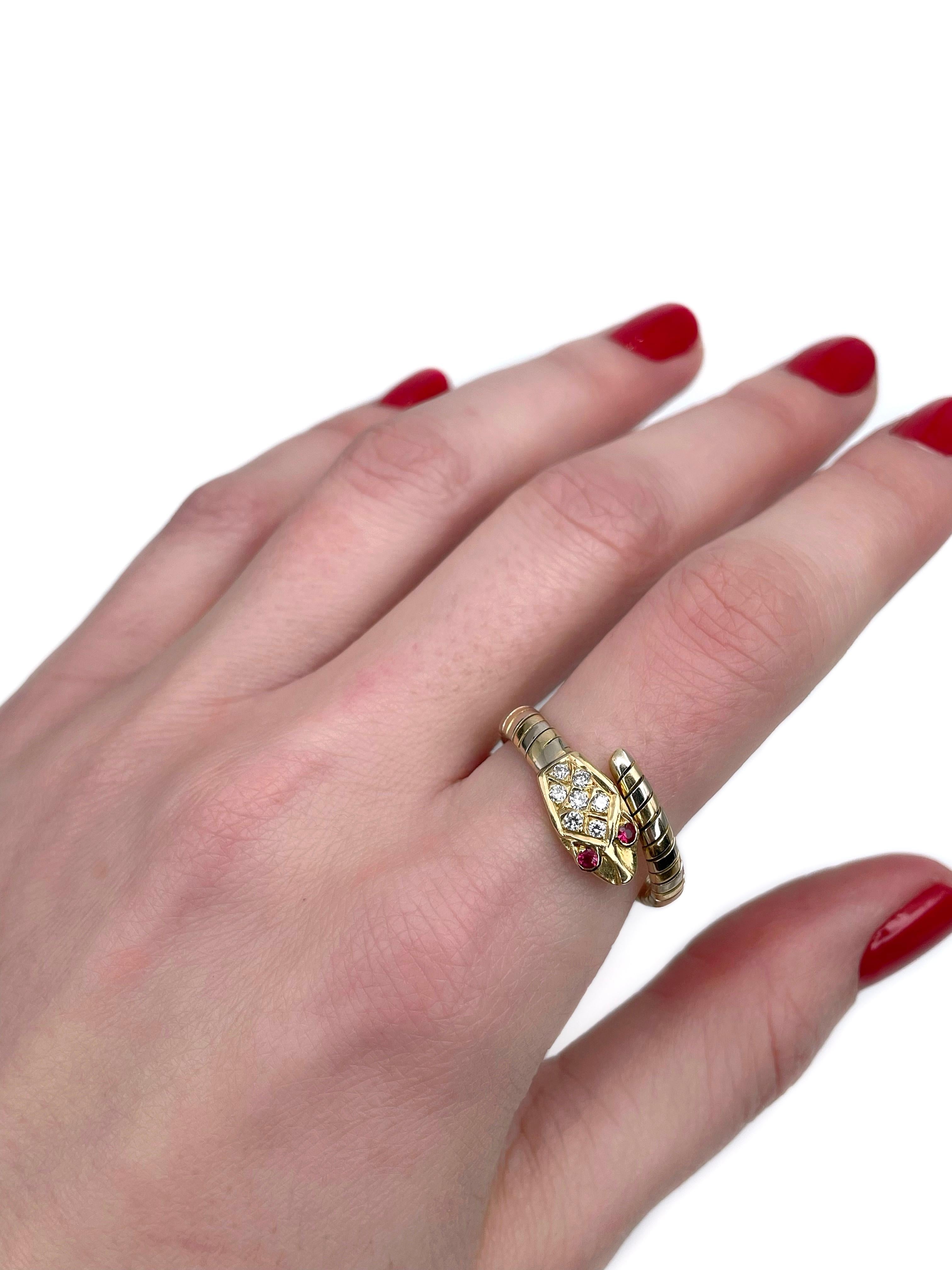 This is a vintage snake ring crafted in 18K bi-colour gold. Circa 1970.

The piece features:
- 7 diamonds (round brilliant cut, TW 0.16ct, RW-W, VS-SI)
 - 2 rubies (round cut, TW 0.08ct, slpR 4/4, VS) 

The ring is flexible. This let it adjusting to