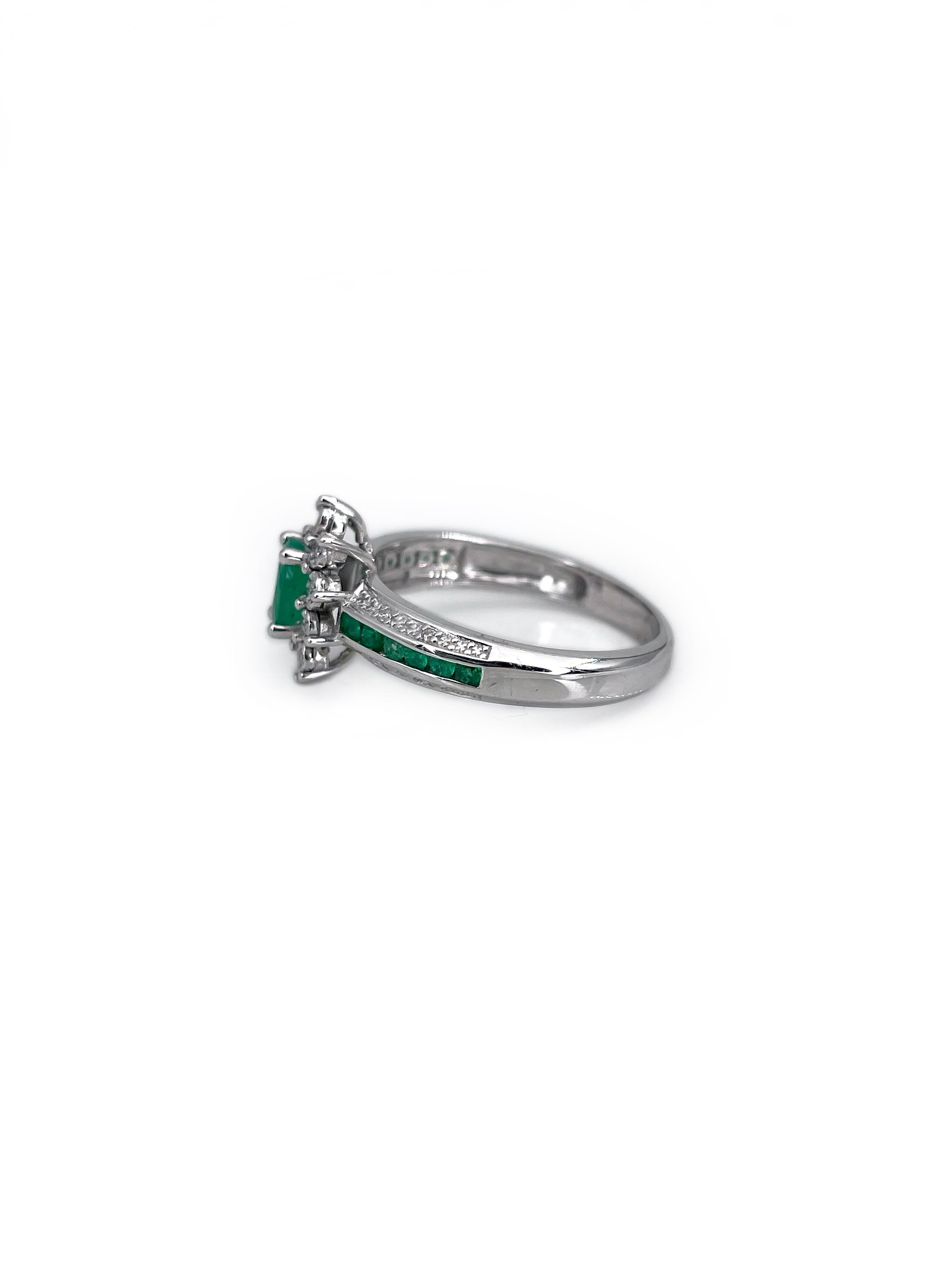 This is a vintage cluster ring crafted in 18K white gold. The piece features:
- 13pcs. emeralds: round and oval cut, 0.38ct, vslbG 5/4, P1-P2
- 14pcs., diamonds: brilliant cut, 0.07ct, RW+/RW, SI

Weight: 4.14g 
Size: 17.75 (US 7.5)

IMPORTANT: