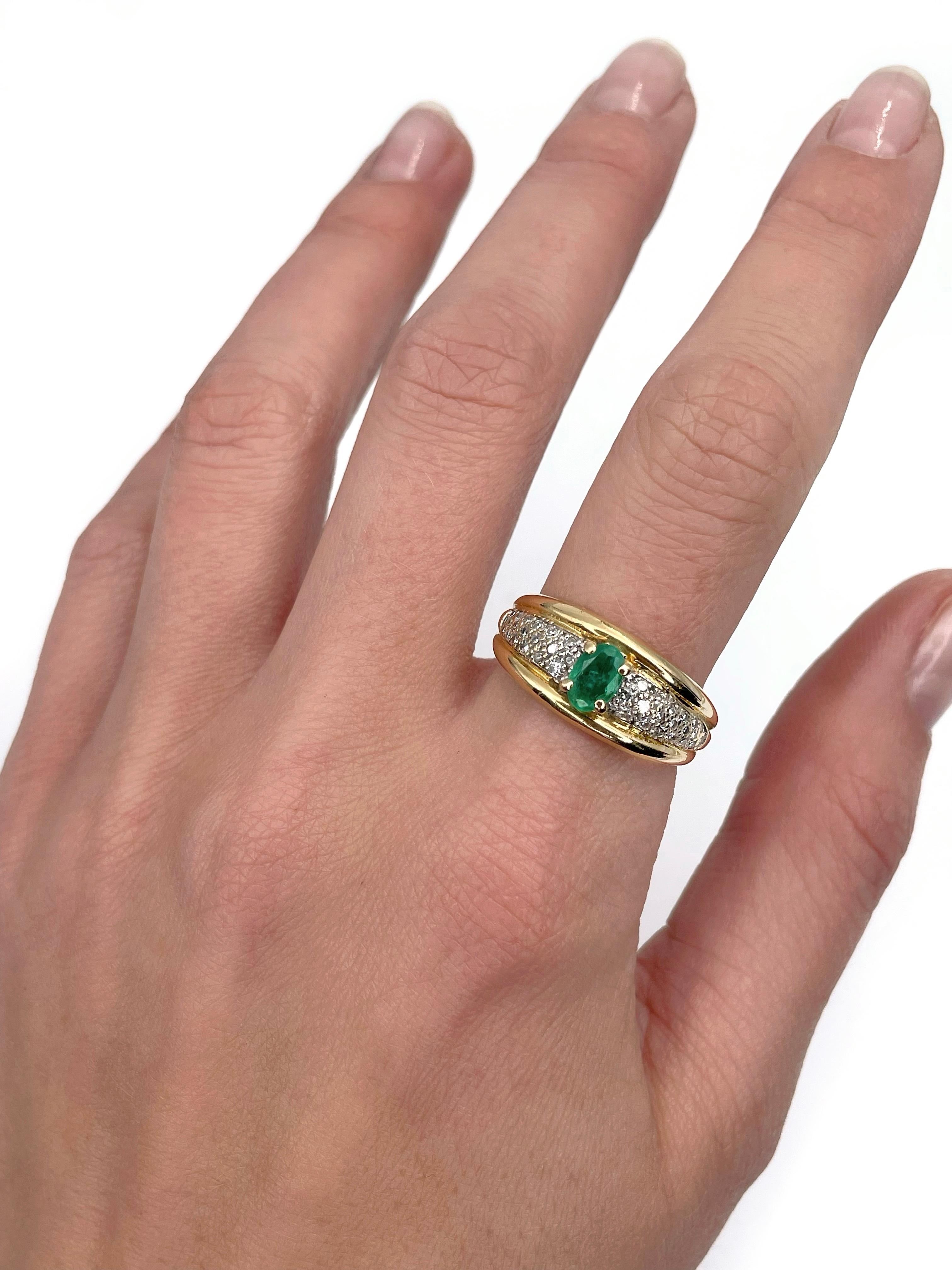 This is a vintage band ring crafted in 18K yellow gold. The piece features:
- 1 pc. emerald: oval cut, 0.45ct, vslbG 5/5, I1, F
- 38 pcs., diamonds: round cut, 17 facet, 0.19ct, RW-W, VS-SI2

Weight: 6.39g 
Size: 18.25 (US 8)

IMPORTANT: please ask