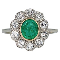 Vintage 18 Karat Gold 0.50 Carat Emerald 0.50 Carat Diamond Cluster Ring