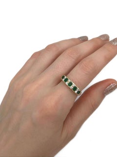 Vintage 18 Karat Gold 0.65 Carat Emerald 0.21 Carat Diamond Five-Stone Ring