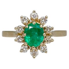 Retro 18 Karat Gold 0.70 Carat Emerald 0.32 Carat Diamond Cluster Ring