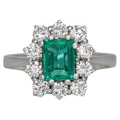 Vintage 18 Karat Gold 0.75 Carat SI Emerald 0.70 Carat Diamond Cluster Ring