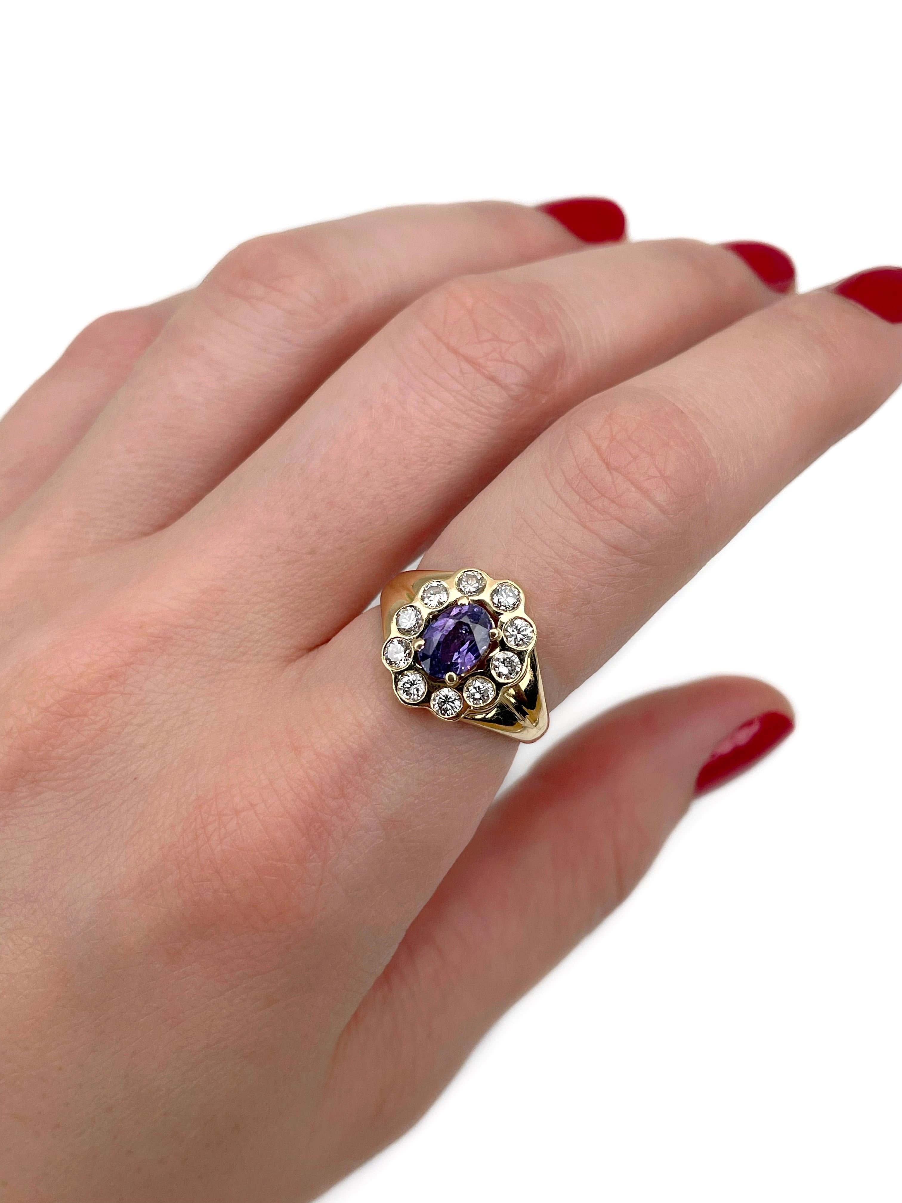 This is a vintage cluster ring crafted in 18K yellow gold. Circa 1980. 

It features:
- 1 purple sapphire (oval cut, 0.80ct, bP 4/3, SI)
- 10 diamonds (round brilliant cut, TW 0.55ct, W-STW, VS-SI)

“Violette 33/03” engraved on the shank. 

Weight: