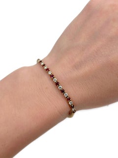 Tennisarmband aus 18 Karat Gold, 0,80 Karat Rubin 0,55 Karat Diamant