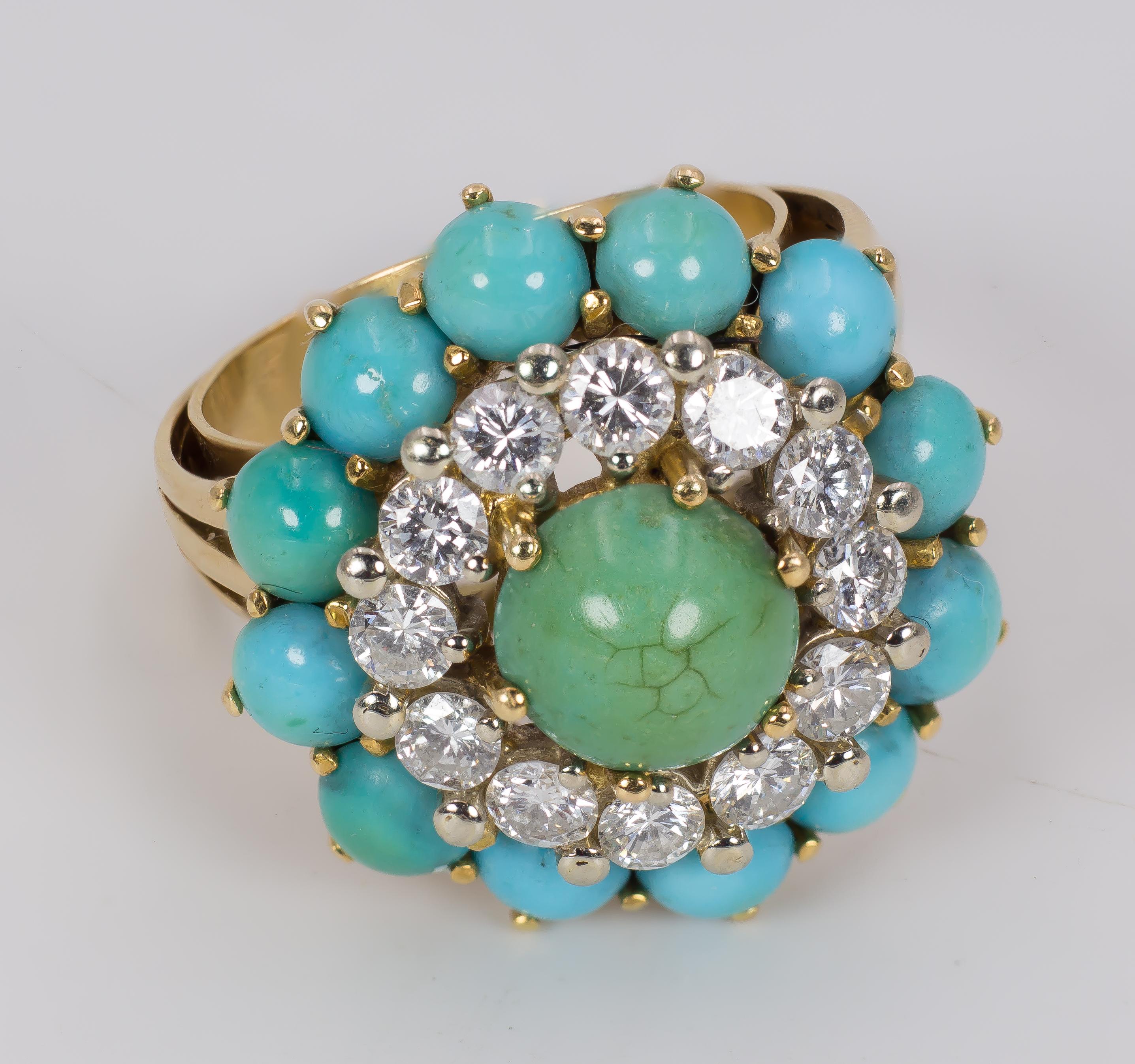A vintage gold, diamond and turquoise ring, dating from the 1960s. This wonderful ring is set with a central turquoise, surrounded by twelve 0.10ct round cut diamonds, totalling 1.2ct, and by another crown of twelve turquoises. The ring is cradfted