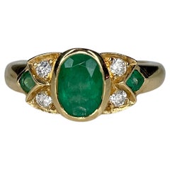 Retro 18 Karat Gold 1.33 Carat Emerald 0.18 Carat Diamond Band Ring