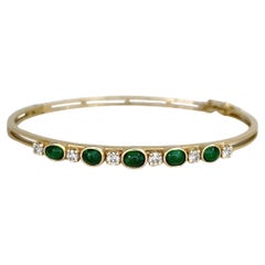 Brazalete abisagrado vintage de oro de 18 quilates con esmeralda de 1,40 quilates y diamante de 0,42 quilates