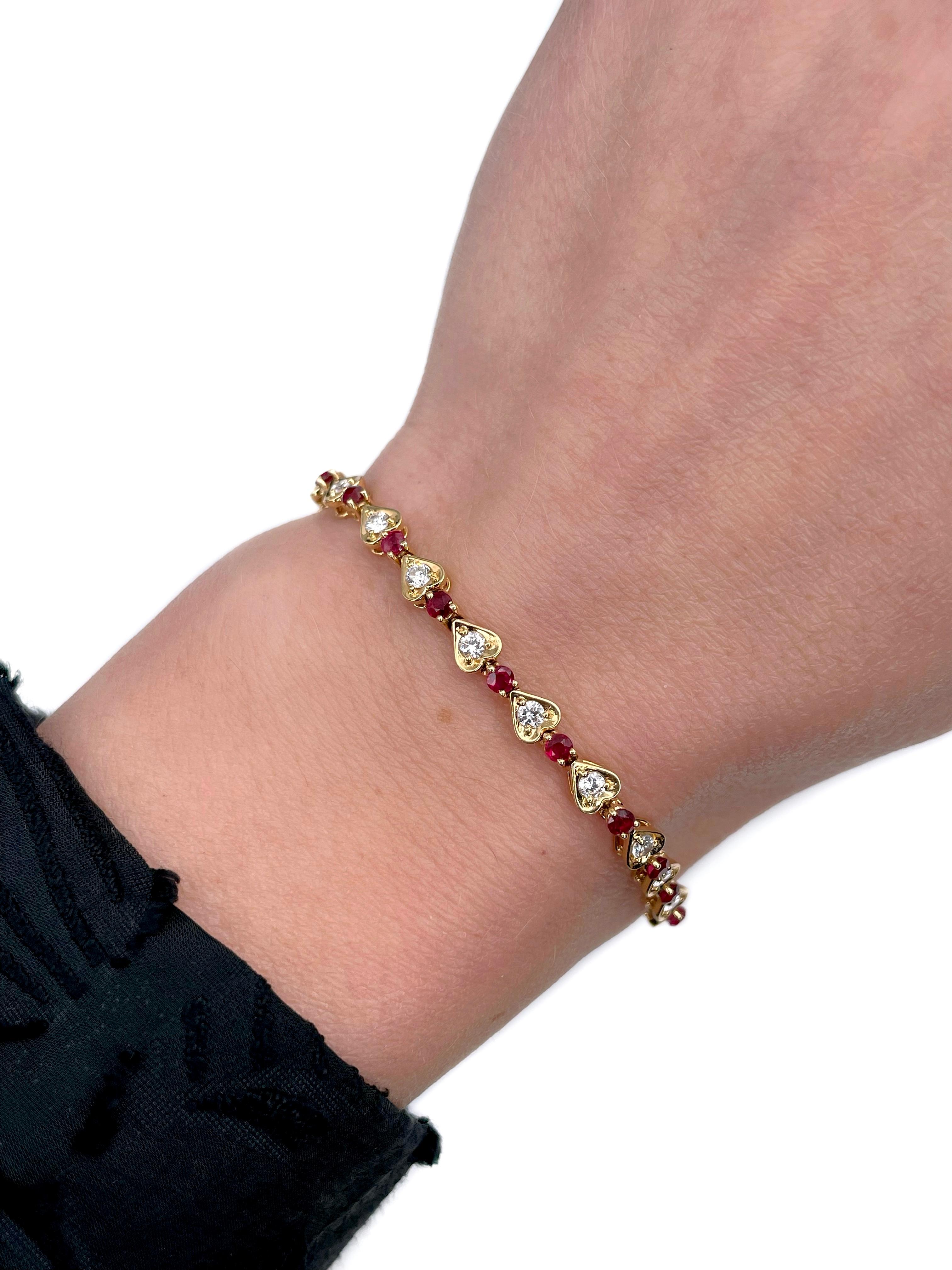 This is a vintage heart motif tennis bracelet crafted in 18K yellow gold. Circa 1990. 

The piece features:
- 22 rubies, round cut, TW 1.50ct, slpR 6/4, VS-SI
- 22 diamonds, brilliant cut, TW 1.10ct, EW-RW+, VVS-VS

Weight: 8.90g
Length: