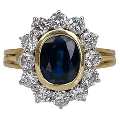 Vintage 18 Karat Gold 1.81 Carat Sapphire 1.00 Carat Diamond Cluster Ring
