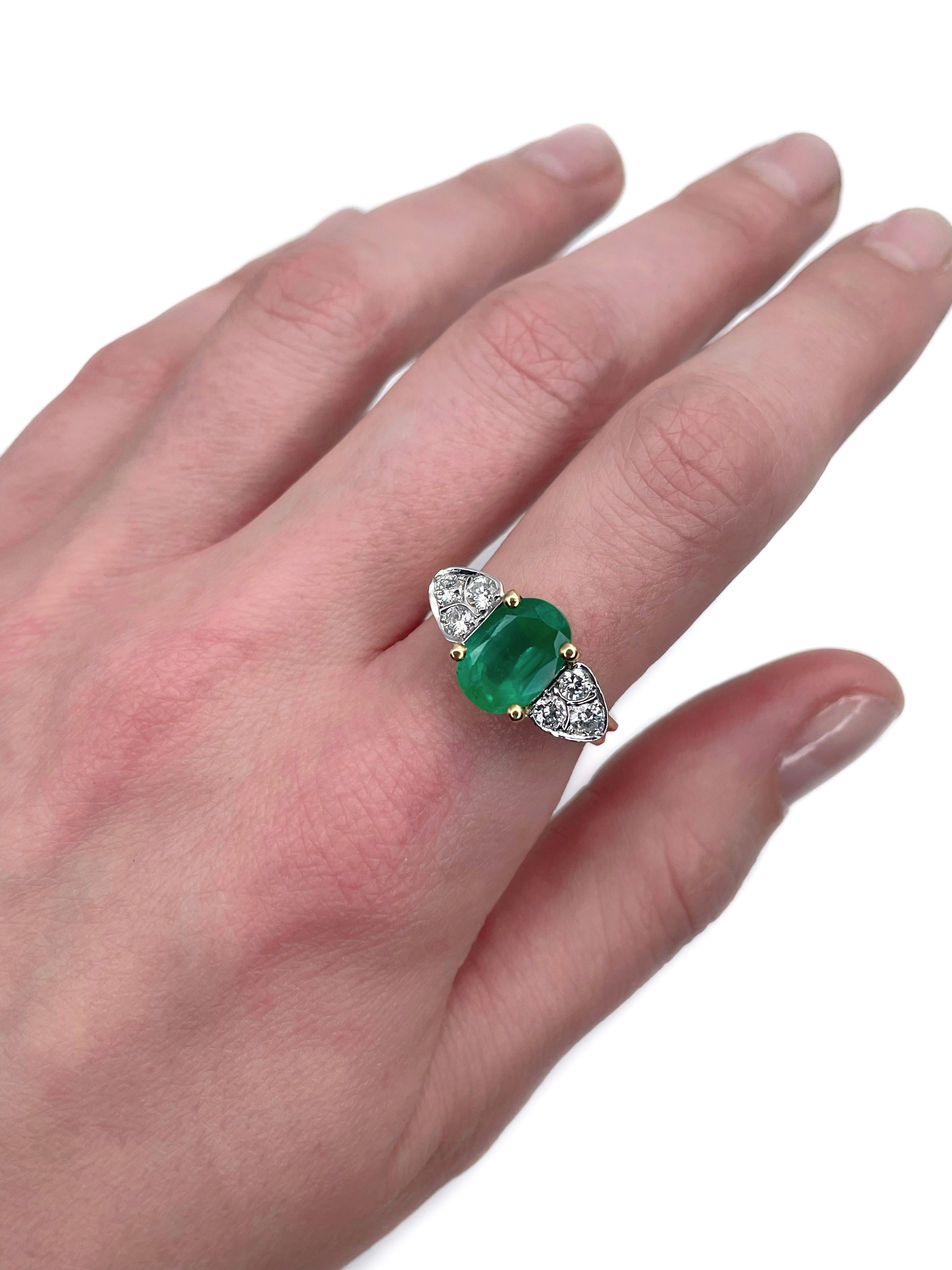 This is a vintage engagement ring crafted in 18K yellow gold. Circa 1980. 

The piece features:
- 1 emerald (oval cut, 2.43ct, F)
- 6 diamonds (round brilliant cut, TW 0.48ct, RW-W, SI-P1)

Weight: 5.65g 
Size: 17.5  (US 7.25)

IMPORTANT: please ask