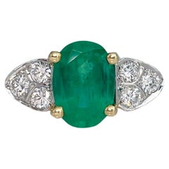 Anillo de compromiso vintage de oro de 18 quilates con esmeralda de 2,43 quilates y diamantes de 0,48 quilates