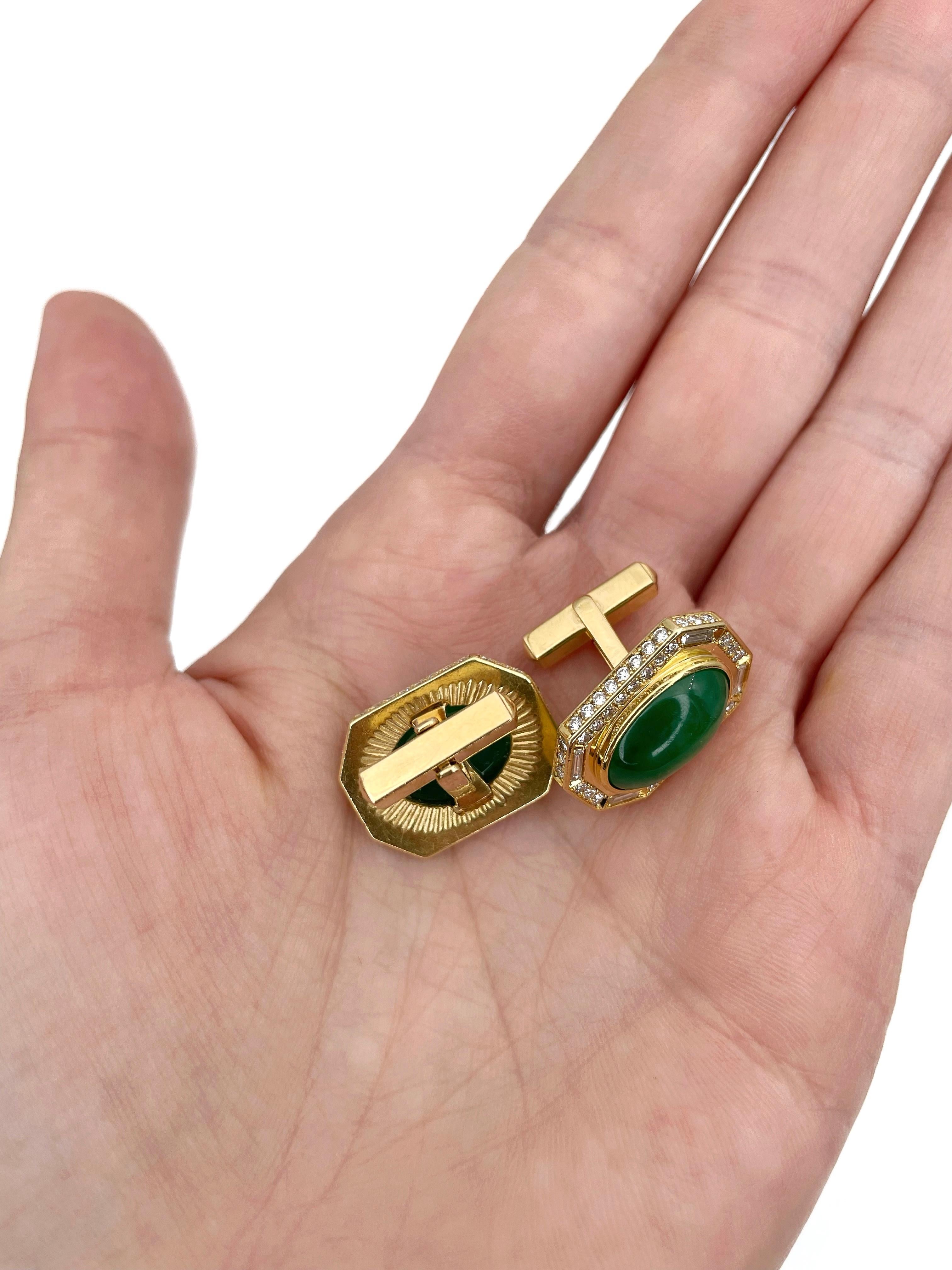 This is a fabulous pair of rectangle cufflinks crafted in 18K yellow gold. It features 2 vivid green cabochon cut chalcedonies (TW 3.00ct, D). The gems are surrounded by 120 round and baguette shape diamonds: TW 1.92ct, RW-W, VS-SI. 

Size: