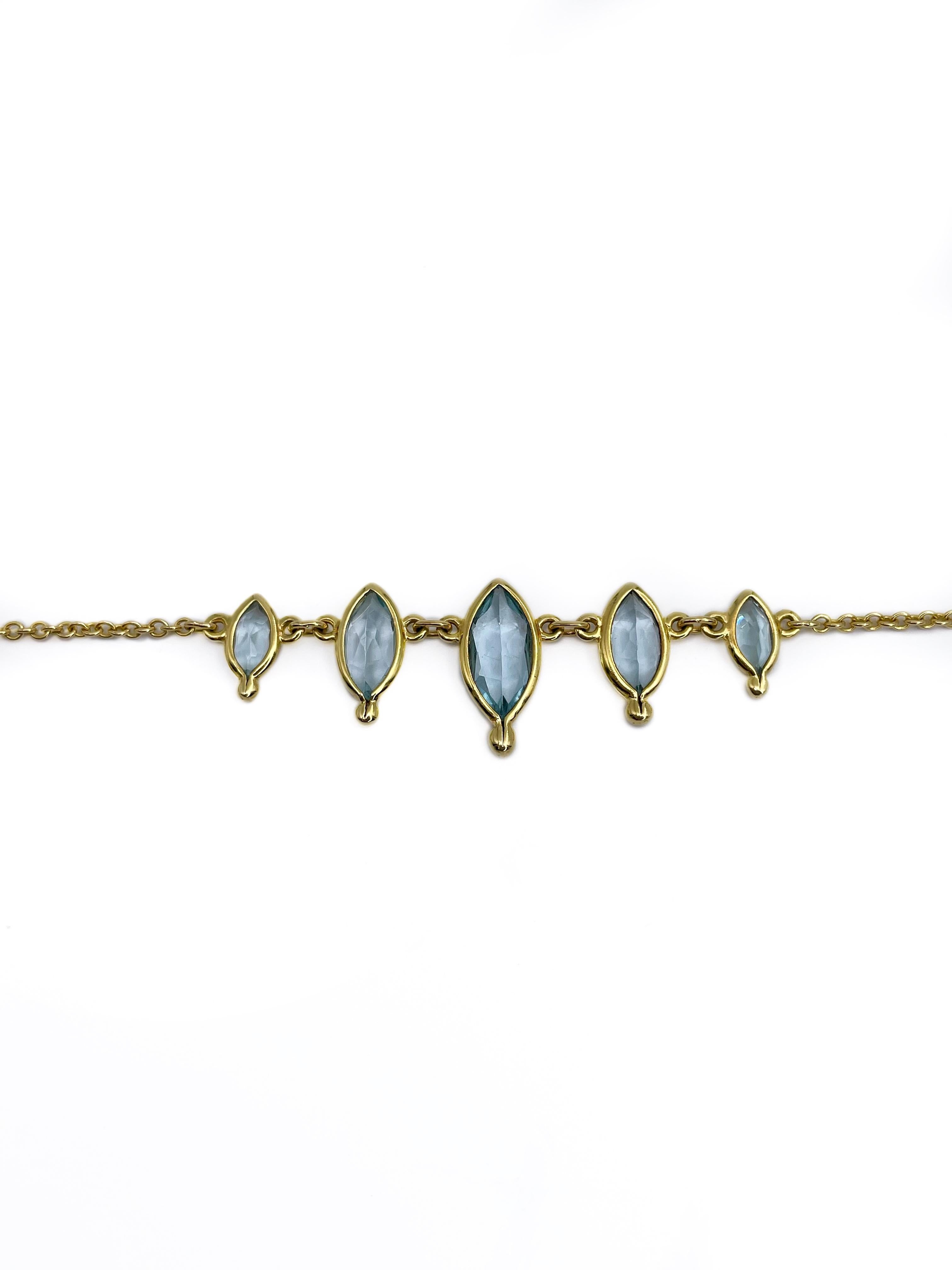 This is an elegant vintage collier necklace crafted in 18K yellow gold. It features 7 marquise cut blue topazes: TW 3.76ct, B 2/2, VVS-VS. 

Weight: 5.02g
Length: 42cm

———

If you have any questions, please feel free to ask. We describe our items