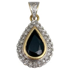 Vintage 18 Karat Gold 4.00 Carat Pear Cut Sapphire 0.25 Carat Diamond Pendant