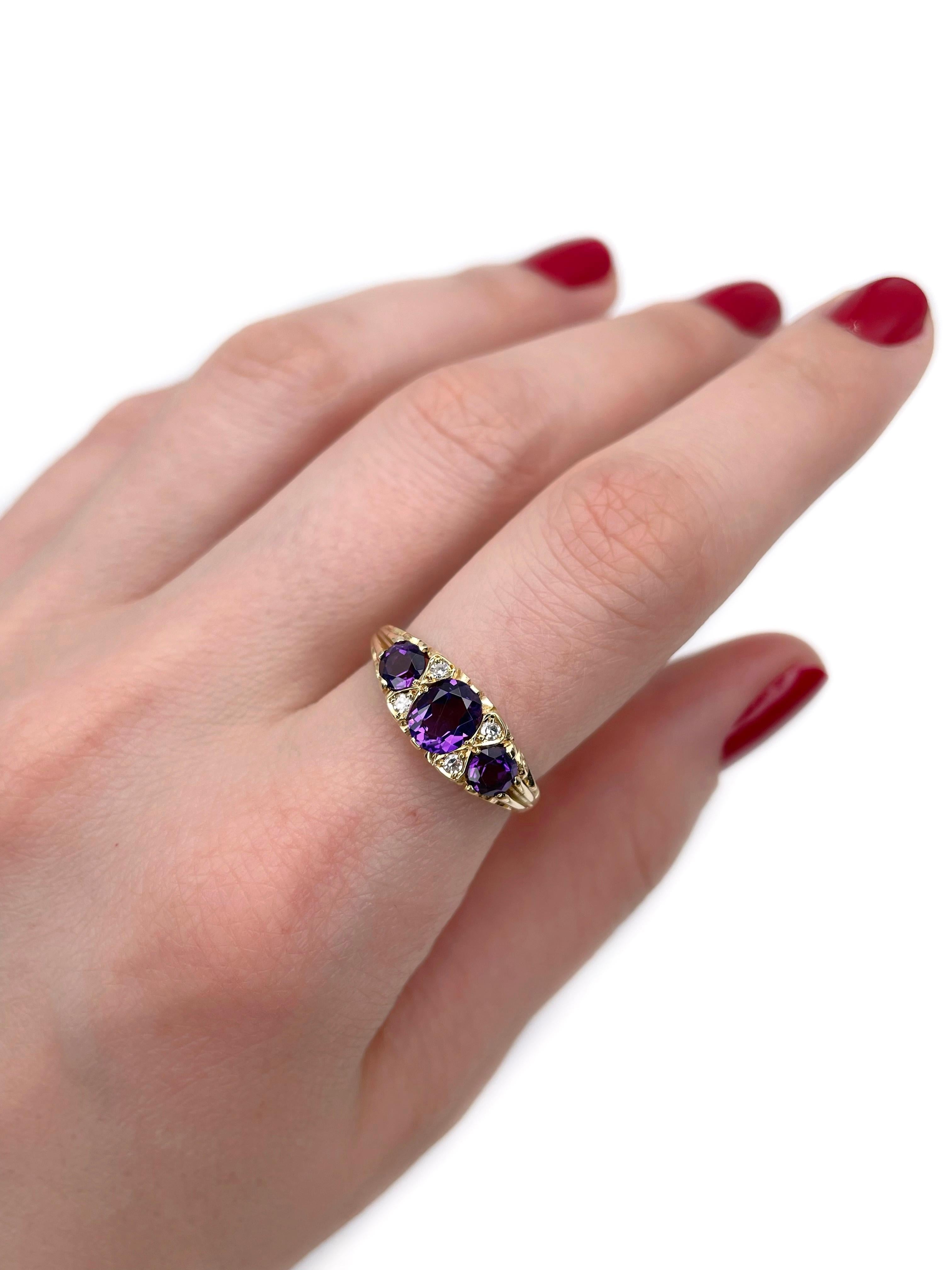This is a vintage three-stone ring crafted in 18K yellow gold. Circa 1970. 

The piece features:
- 3 amethysts, oval and round cut, medium purple
- 4 diamonds, single cut

Weight: 3.92g
Size: 17.25 (US 6.75)

IMPORTANT: please ask about the