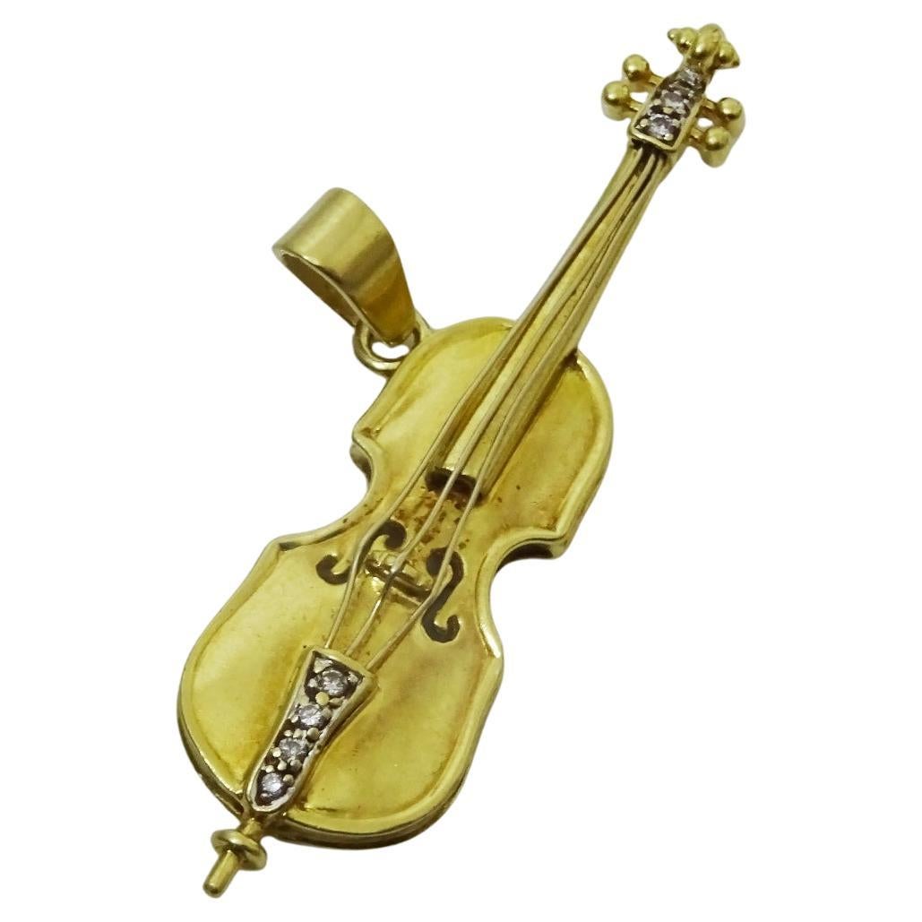 Vintage 18 karat Gold and Diamond Cello Pendant For Sale
