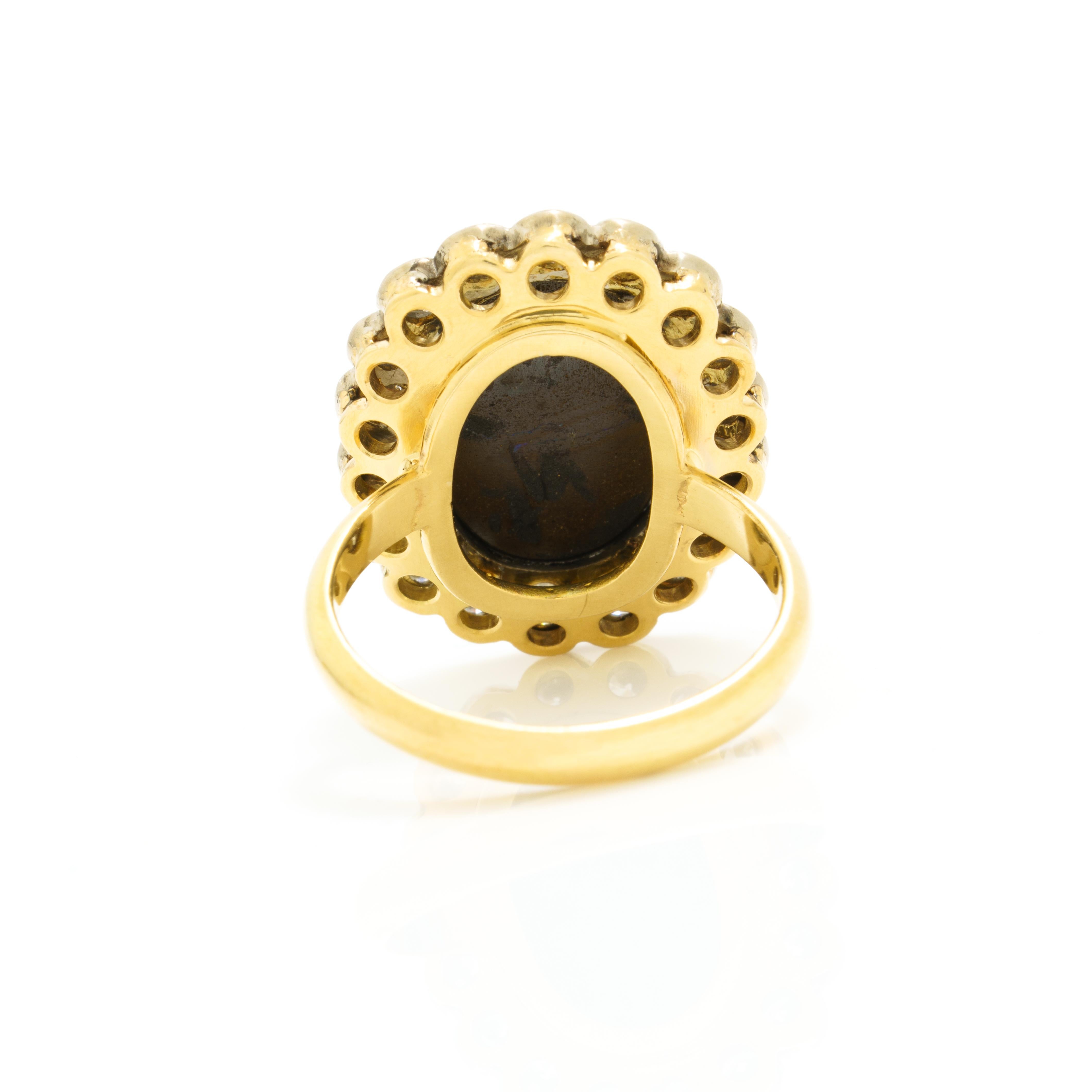 Vintage Halo-Ring aus 18 Karat Gold und Platin mit 5.0 Karat schwarzem Opal und Diamant im Zustand „Gut“ im Angebot in New York, NY