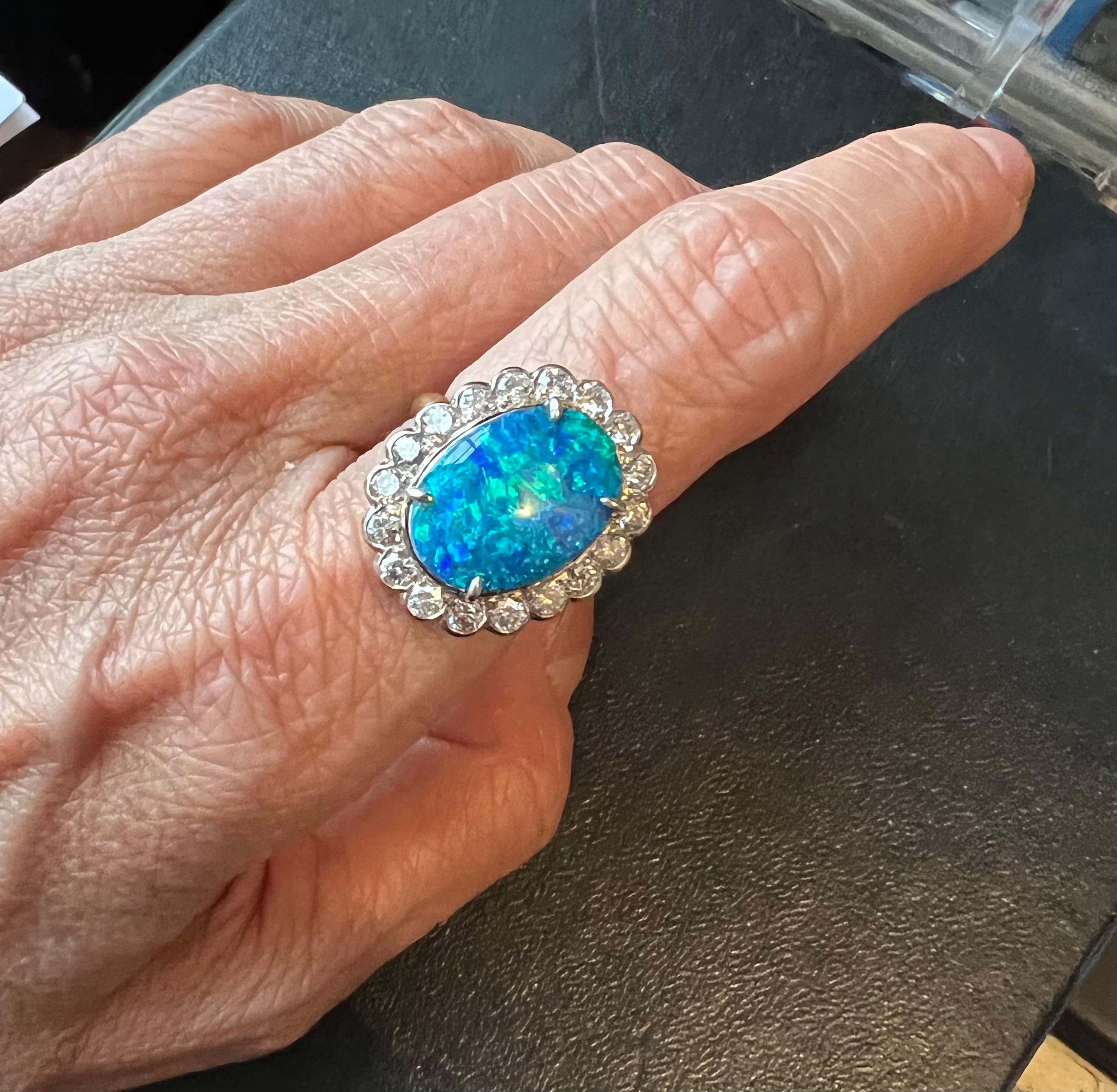 Women's or Men's Vintage 18 Karat Gold and Platinum 5.0 Carat Black Opal and Diamond Halo Ring For Sale