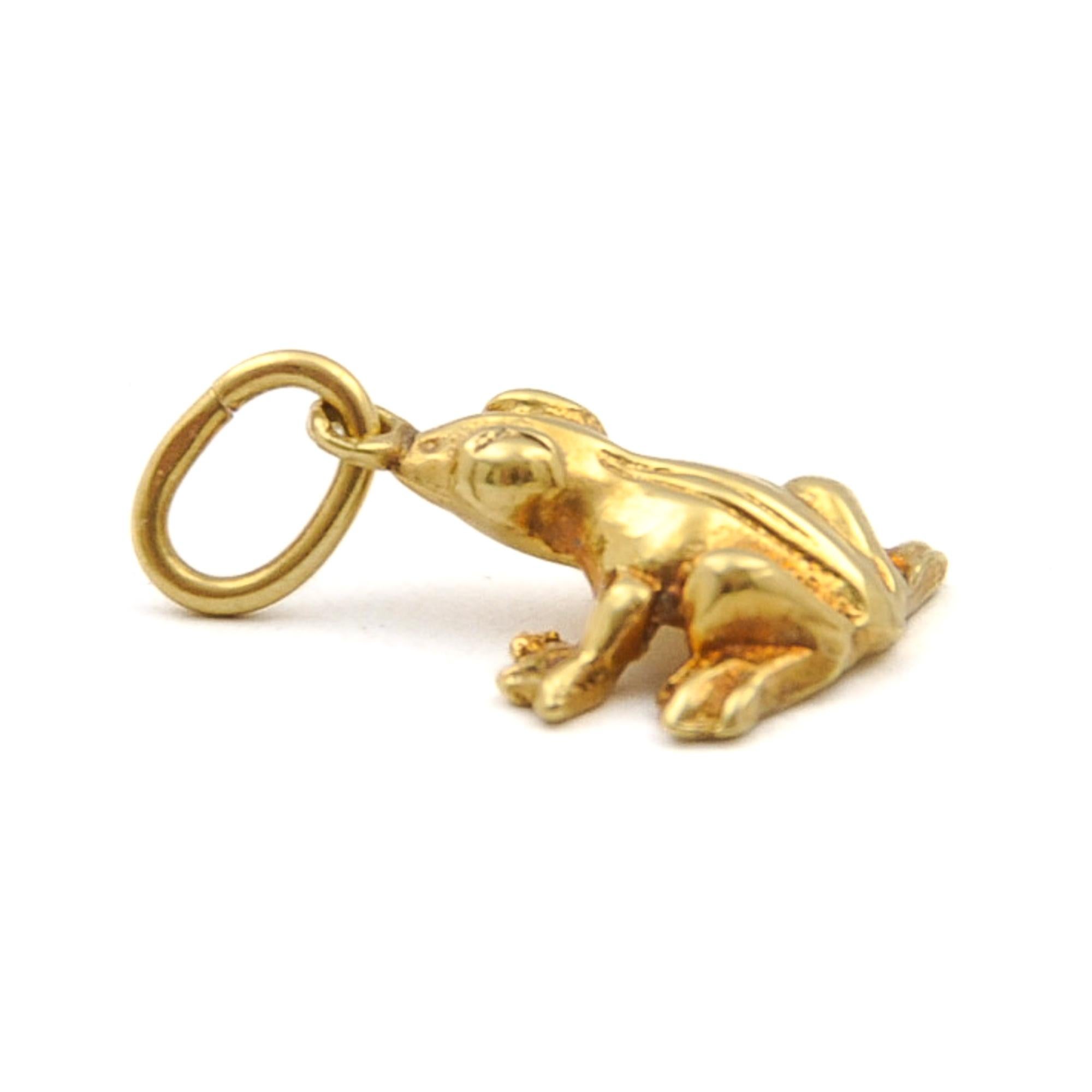 A vintage gold frog charm pendant. This adorable frog has beautiful details. This elegant long legged jumping creature is made in solid 18 karat gold. 

The frog as a spirit animal reminds us of the transience of our lives. As a symbol of transition