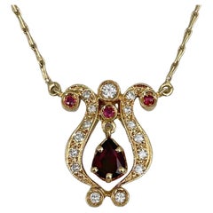 Vintage 18 Karat Gold Garnet 0.10 Carat Ruby 0.24 Carat Diamond Pendant Necklace