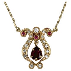 Retro 18 Karat Gold Garnet 0.10 Carat Ruby 0.24 Carat Diamond Pendant Necklace