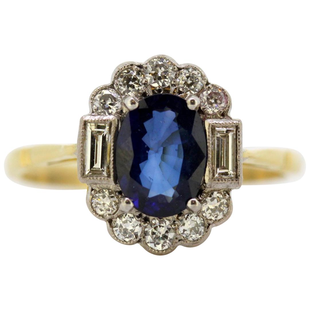 Vintage 18 Karat Gold Ladies Ring with Blue Sapphire and Diamonds, circa 1970
