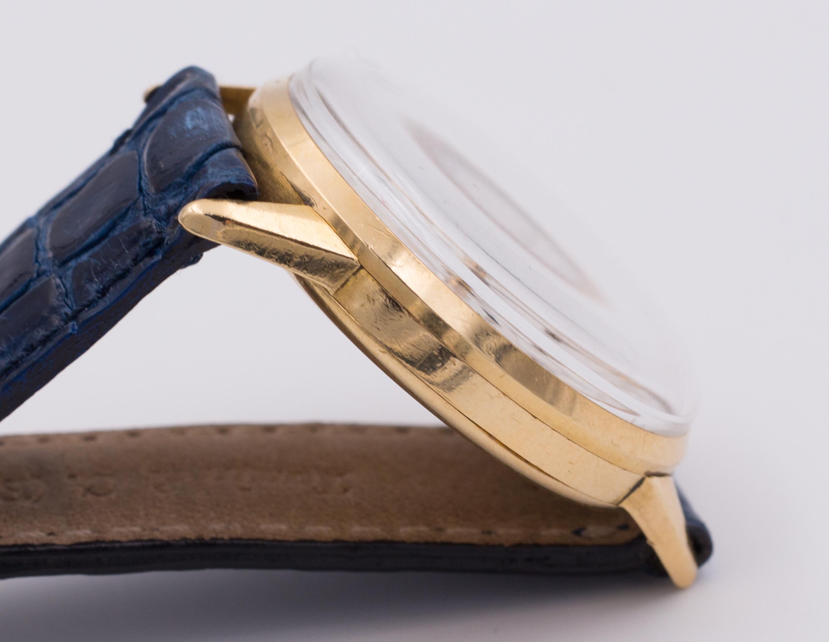 vintage movado 18k gold watch