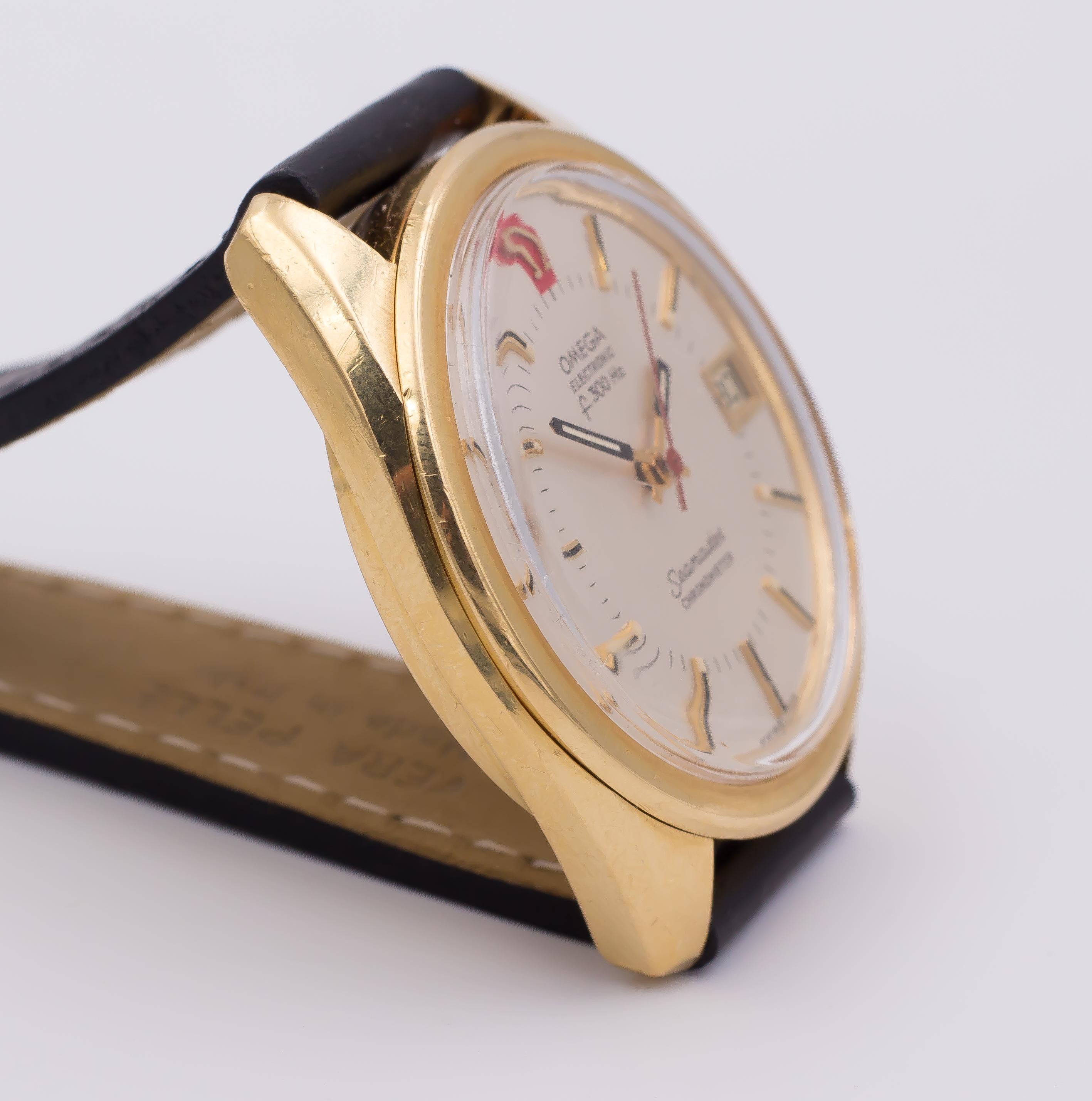 A vintage 18K gold Omega Electronic Seamaster Chronometer wrist watch, dating from the 1970s. 

BRAND
Omega (product line: Electronic Seamaster)

MATERIALS
18K gold

MEASUREMENTS
37 mm