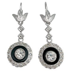 Orecchini vintage con diamante e onice in oro 18 carati con chiusura a leva