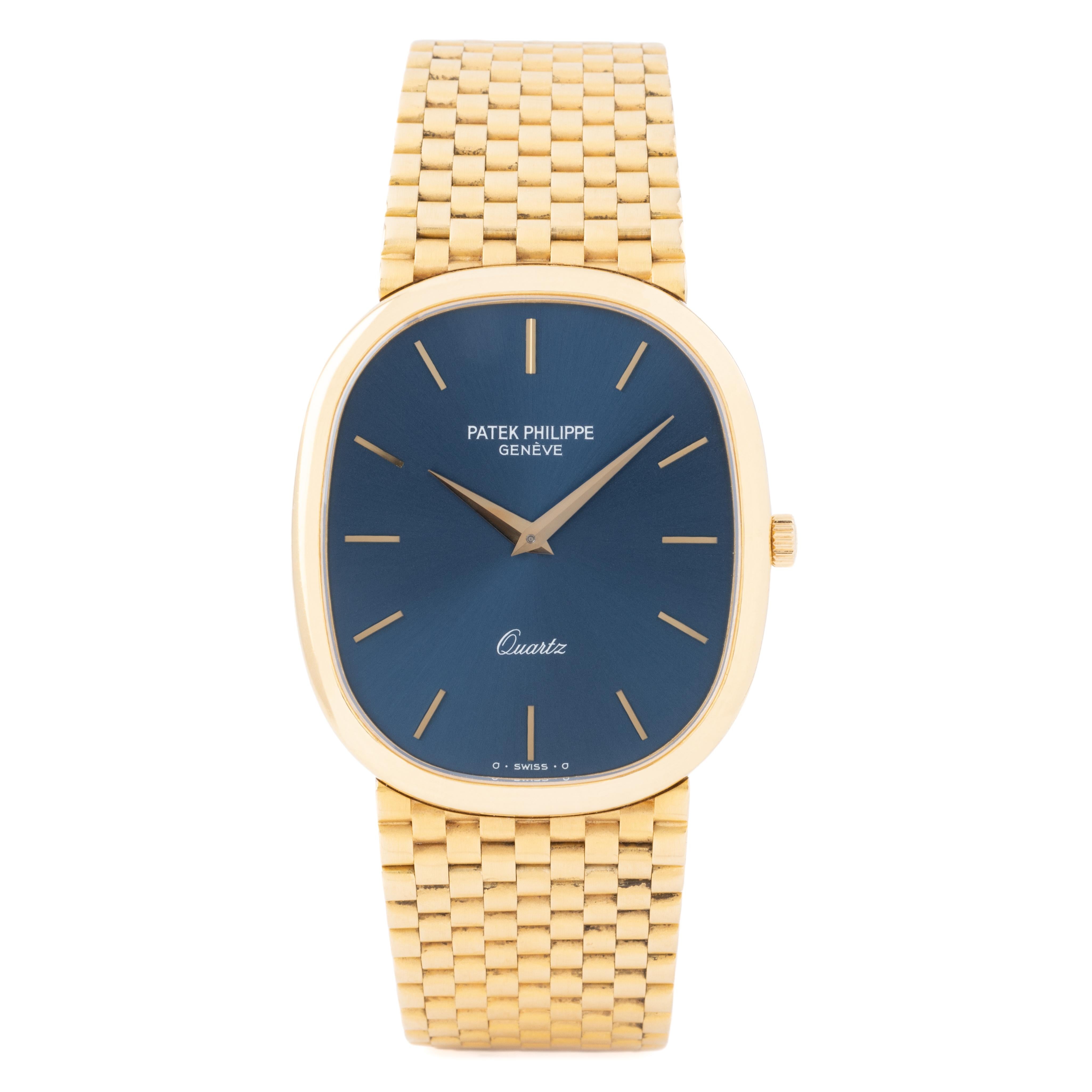 Vintage Patek Philippe 18k Yellow Gold Grand Ellipse
Model 3838/1
Quartz Movement
18k Deployment Buckle
Made in Switzerland
c.1980s

The Patek Philippe 18k Yellow Gold Blue Grand Ellipse wristwatch, with its stunning gold linked bracelet, is a