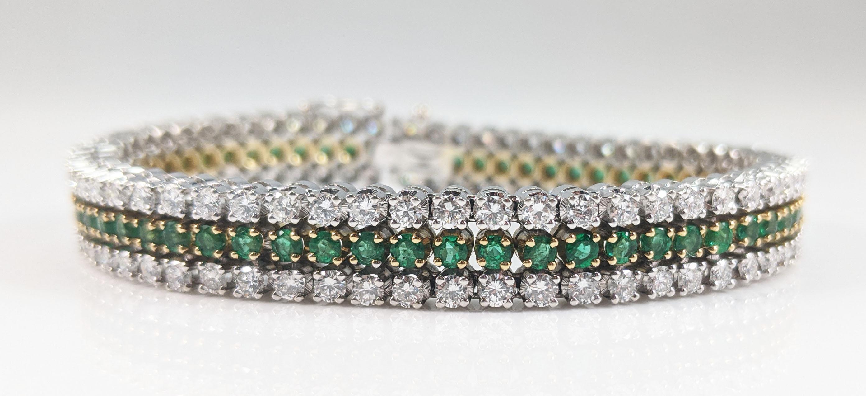 This is an absolutely breathtaking vintage bracelet featuring 18k yellow and white gold and a stunning array of brilliant white diamonds and bright green emeralds. The amazing combination of white and yellow gold serves as the perfect backdrop for