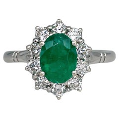 Vintage 18 Karat White Gold 1.40 Carat Emerald 0.80 Carat Diamond Cluster Ring