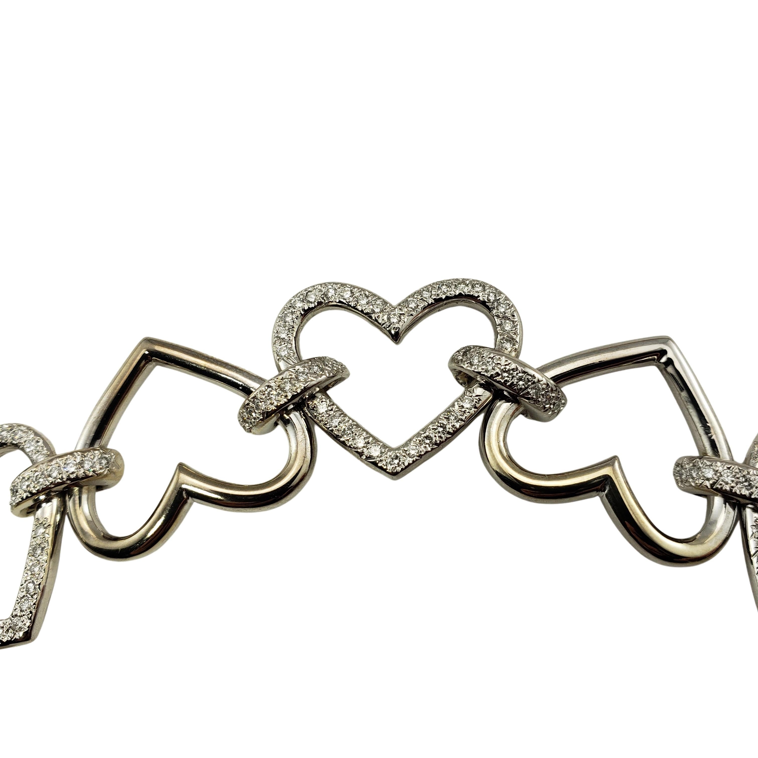 Vintage 18 Karat White Gold and Diamond Heart Link Bracelet In Good Condition For Sale In Washington Depot, CT