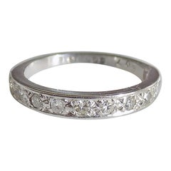 Anello vintage a mezza eternità con diamante in oro bianco 18 carati