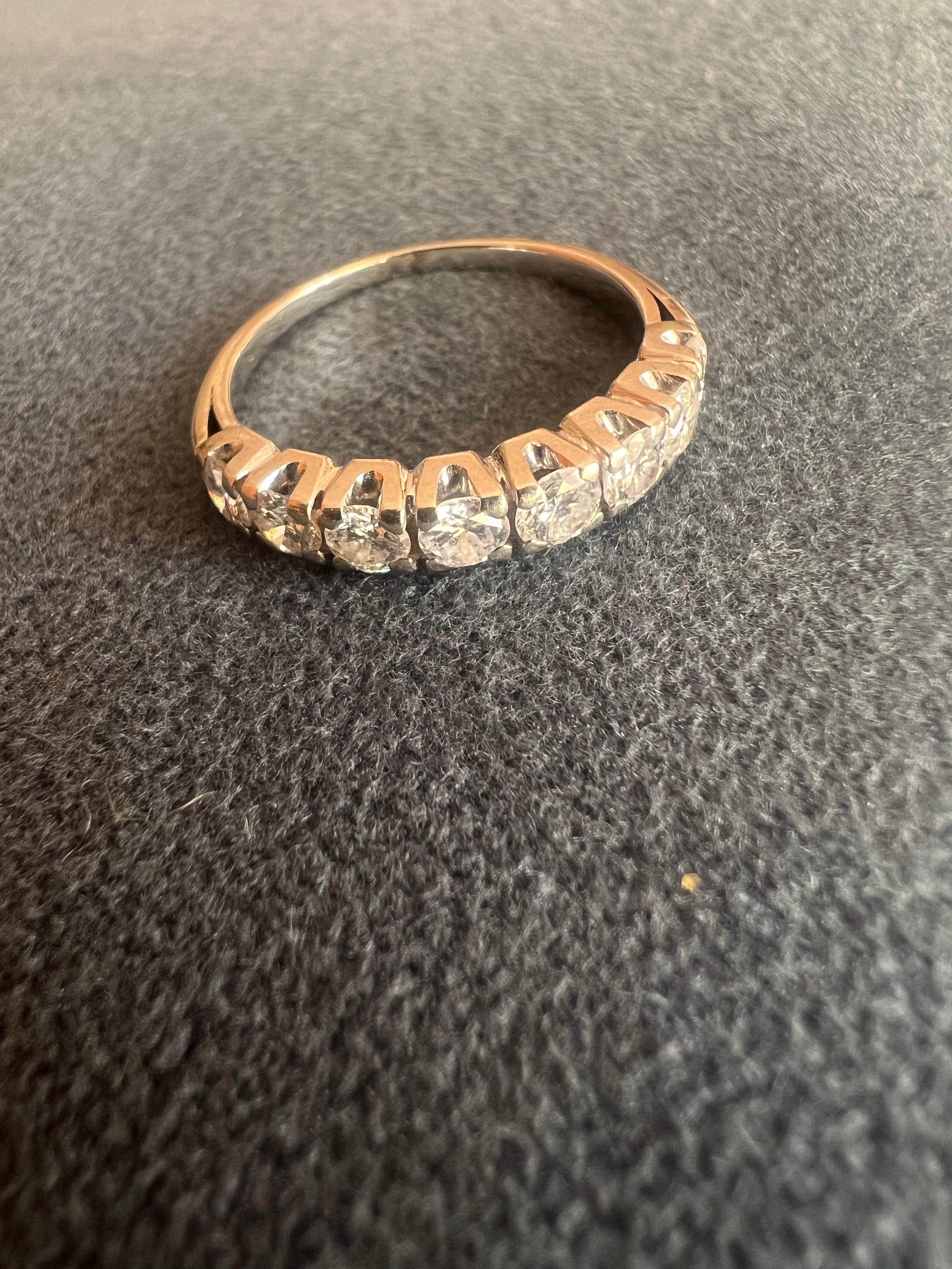 20th Century Vintage 18 Karat White Gold Eight Round Cut Diamonds Band Ring For Sale