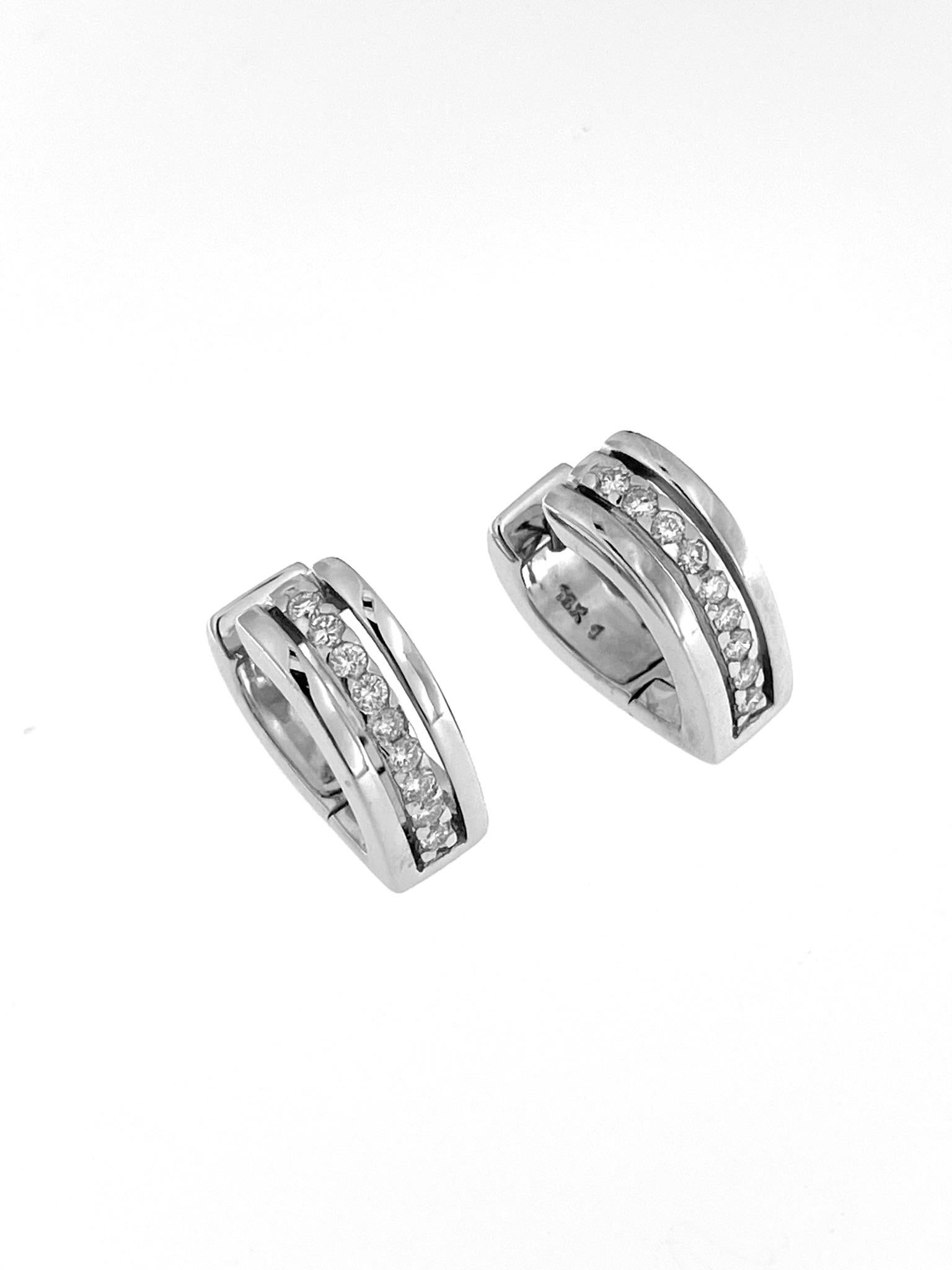 The Vintage 18-karat White Gold French Earrings with Diamonds are a timeless and sophisticated pair of earrings that showcase the enduring beauty of vintage design. Crafted with meticulous attention to detail, these earrings exude elegance and