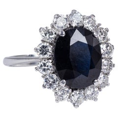 18 Karat White Gold, Sapphire and 1 Carat Round Diamond Cluster Ring, 1960s