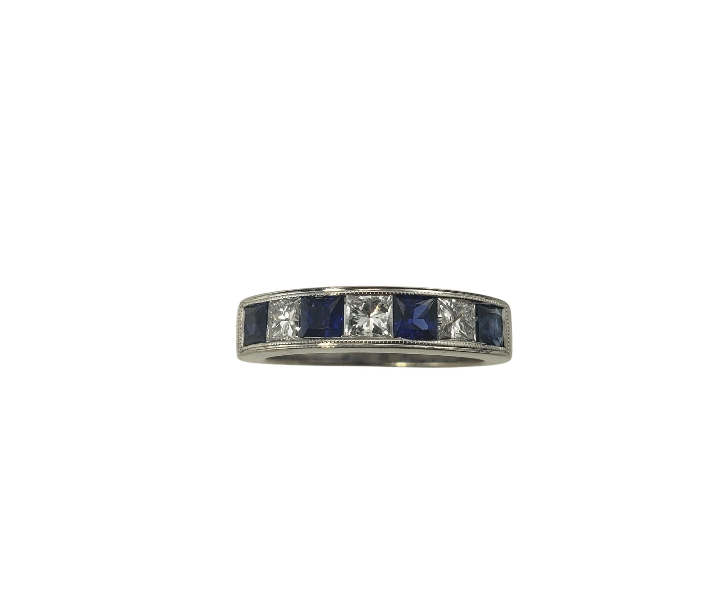 Vintage 18 Karat White Gold Natural Sapphire and Diamond Ring Size 6-

This sparkling band features three princess cut diamonds and four princess cut sapphires set in classic 18K white gold.  4 mm.
Shank:  3 mm.

Approximate total diamond weight: 