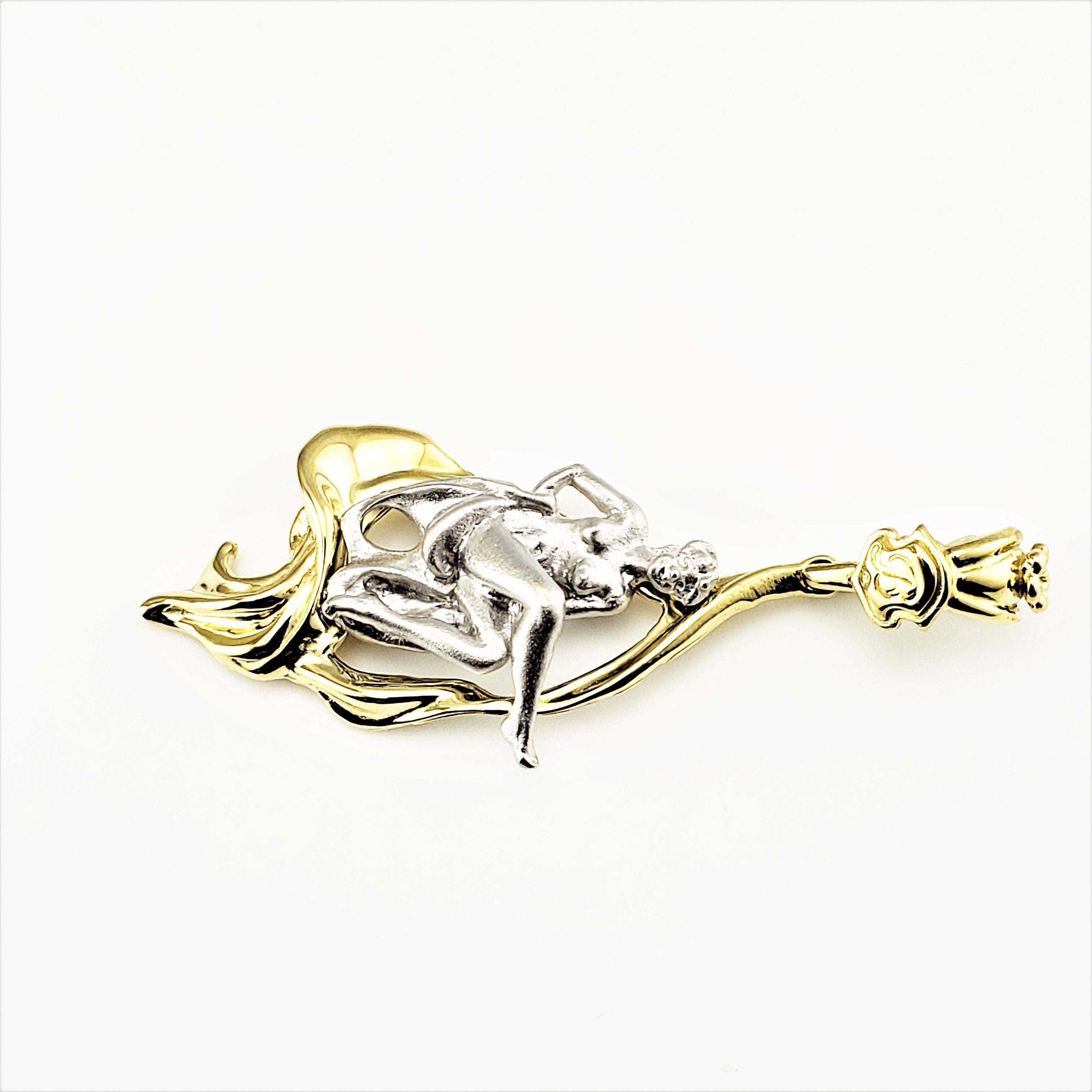 Vintage 18 Karat Yellow and White Gold Art Deco Woman Pendant-

This stunning pendant features a lovely female figure crafted in beautifully detailed white and yellow gold.

*Chain not included.

Size:  50 mm x  19 mm 

Weight:  5.4 dwt. / 8.4 