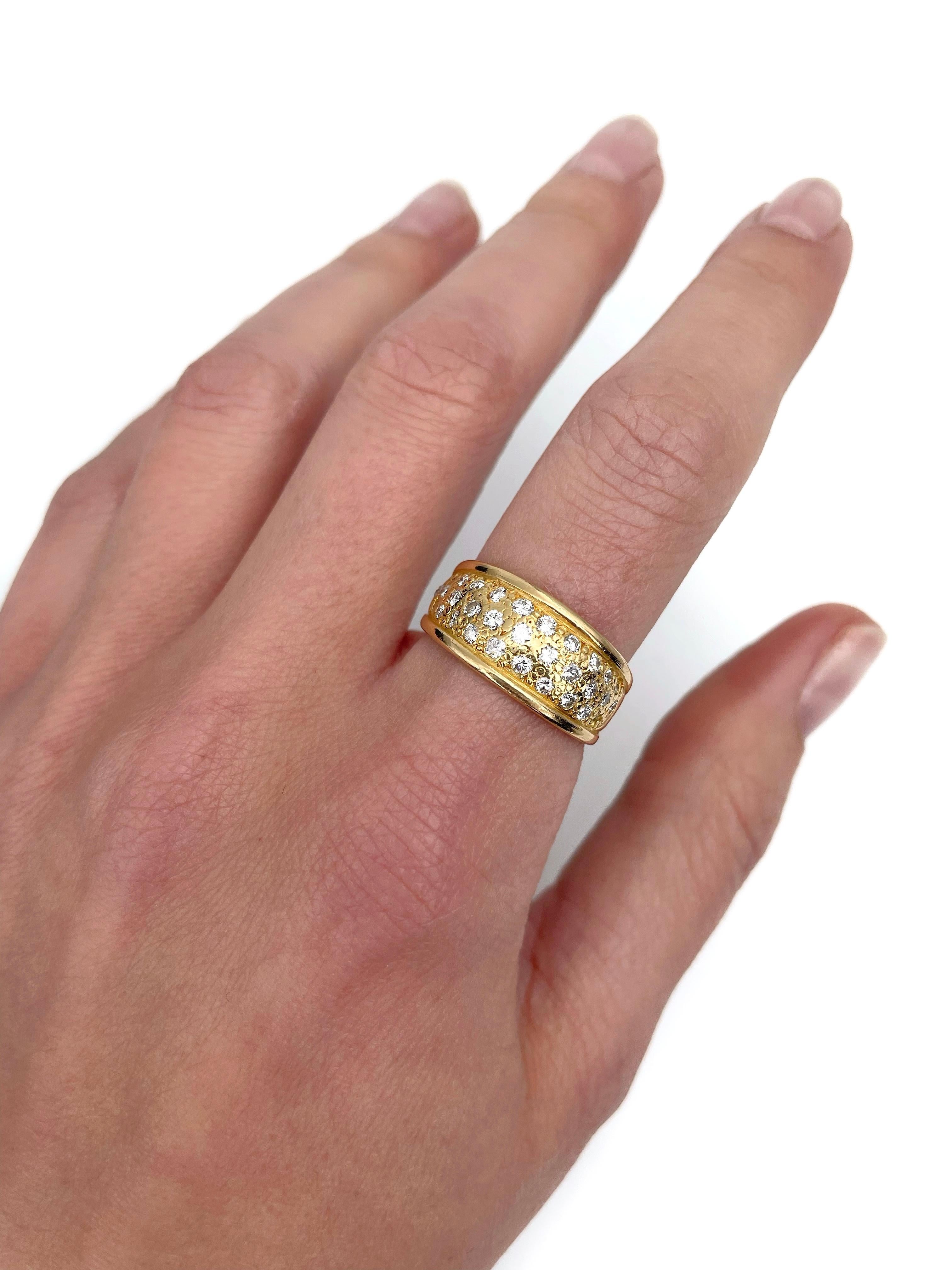 This is a vintage wide band ring crafted in 18K yellow gold. The piece features 31pcs. brilliant cut diamonds: TW 0.77ct, RW+/RW, VS-SI.

Weight: 5.81g 
Size: 17.75 (US 7.5)

———

If you have any questions, please feel free to ask. We describe our