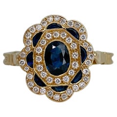 Vintage 18 Karat Yellow Gold 0.87 Carat Sapphire 0.24 Carat Diamond Cluster Ring